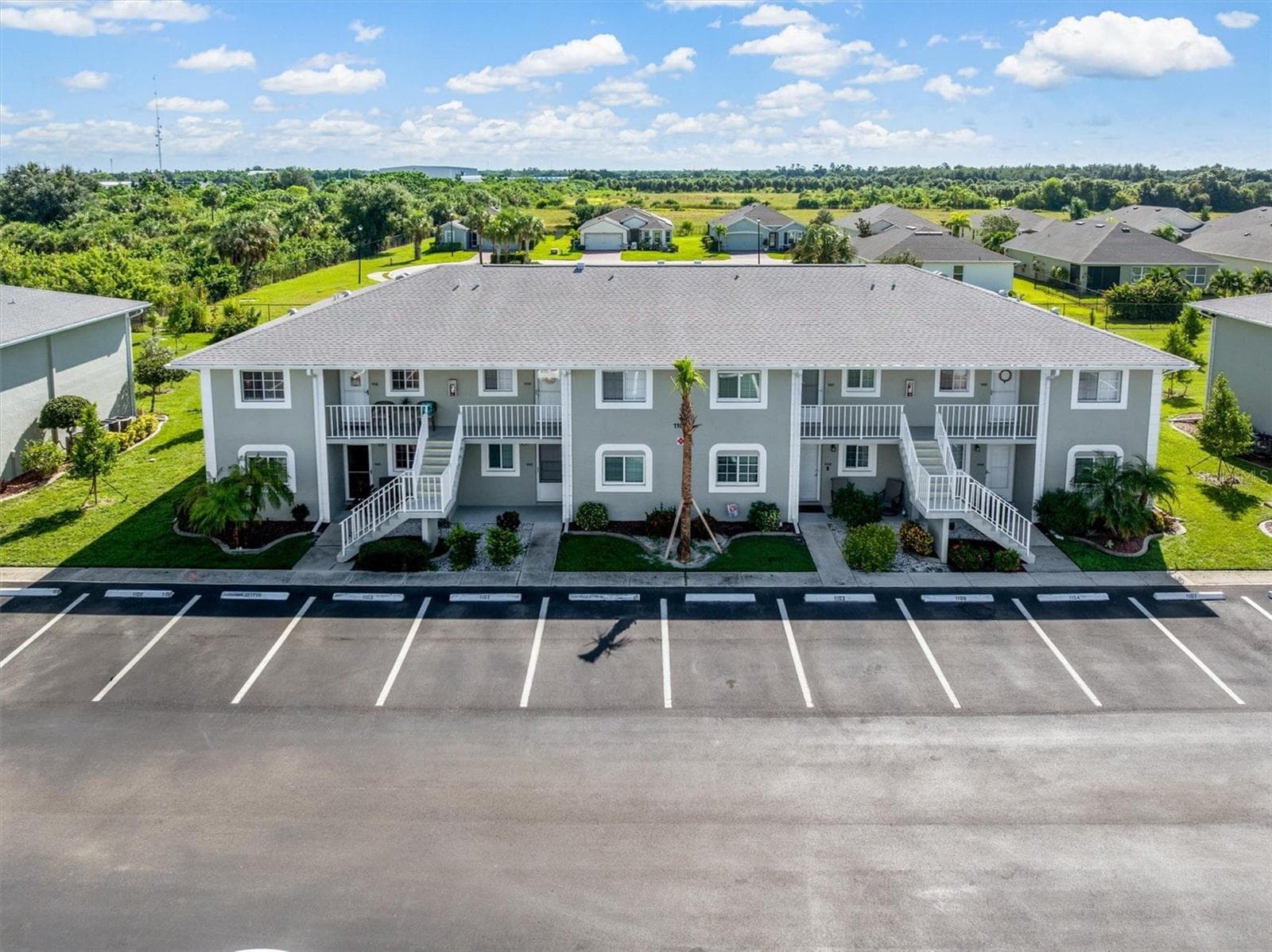 ASSIGNED PARKING NEW NATIVE FLORIDA LANDSCAPING UPDATES - 3310 LOVELAND BLVD #1105, PUNTA GORDA