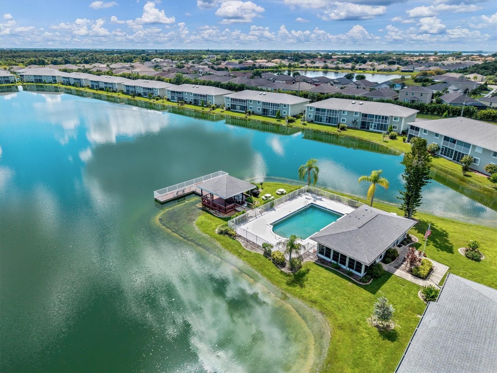 LAKEFRONT COMMUNITY CENTER WITH POOL PAVILION AND FISHING PIER - 3310 LOVELAND BLVD #1105, PUNTA GORDA