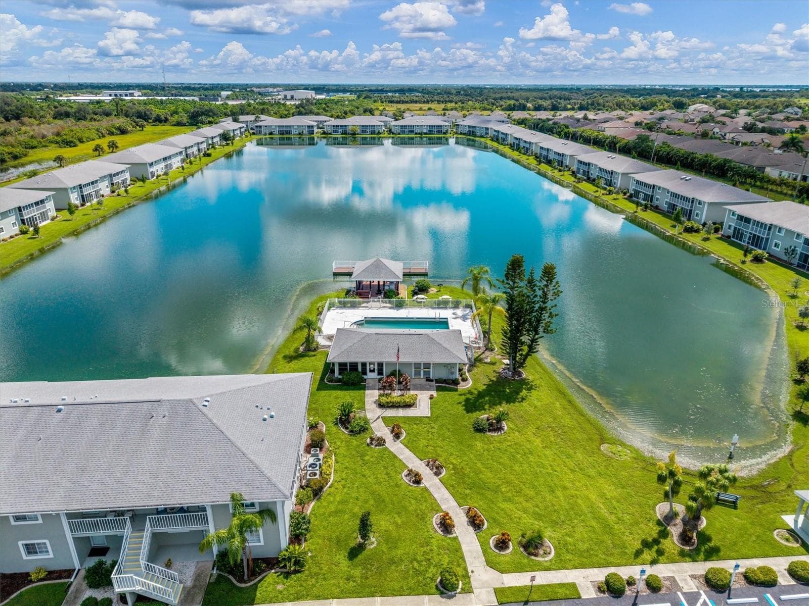 WONDERFUL COMMUNITY CENTER WITH POOL/PAVILLION AND FISHING PIER - 3310 LOVELAND BLVD #1105, PUNTA GORDA