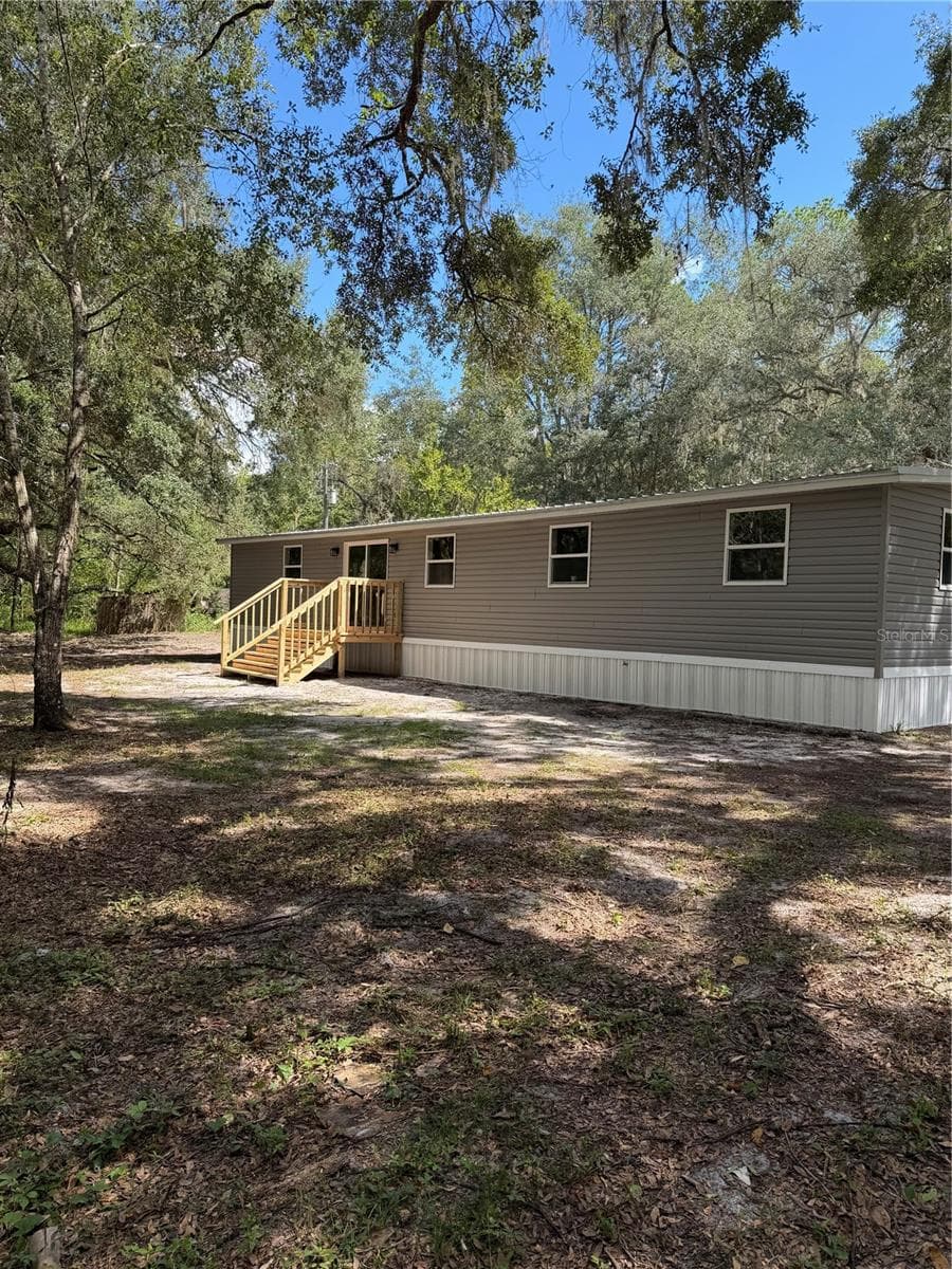 Manufactured Home at 22340 NE 77TH TERRACE RD, CITRA, photo 4 of 30