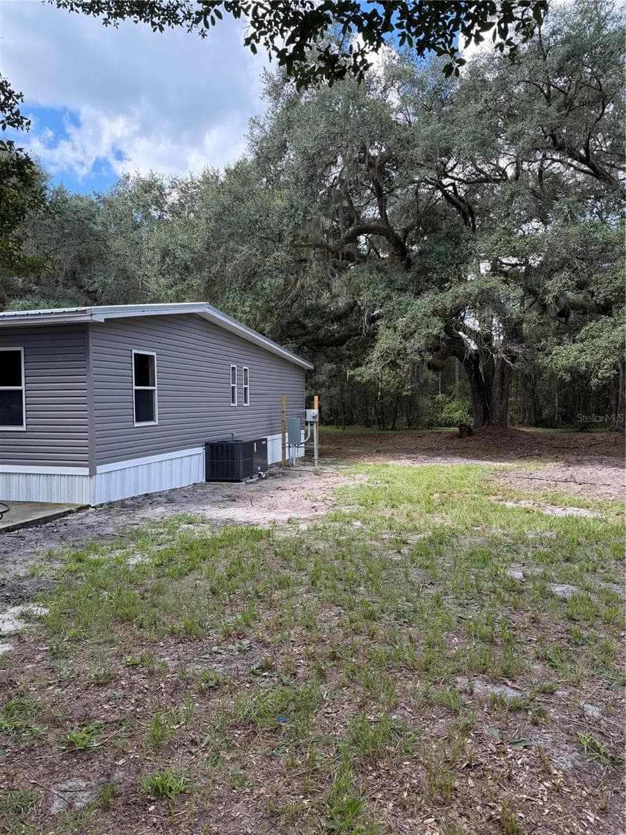 Manufactured Home at 22340 NE 77TH TERRACE RD, CITRA, photo 8 of 30
