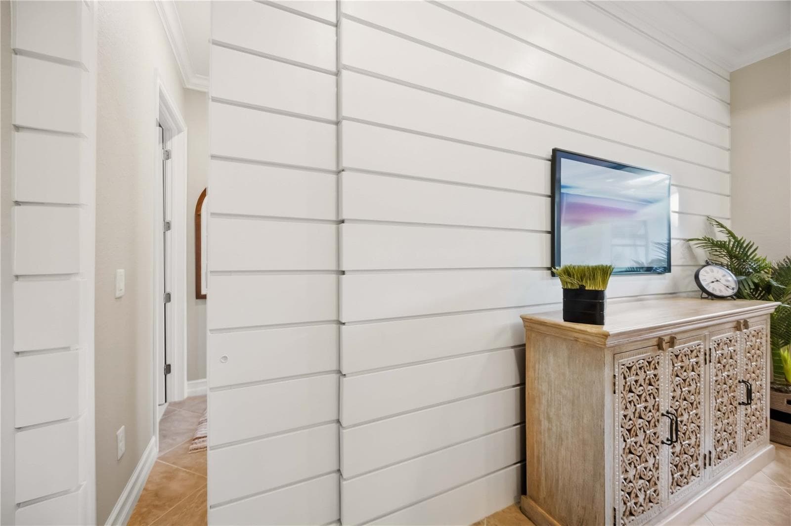 Shiplap wall with hidden shiplap pocket door. Meticulous craftmanship! - 10720 TARFLOWER DR, VENICE