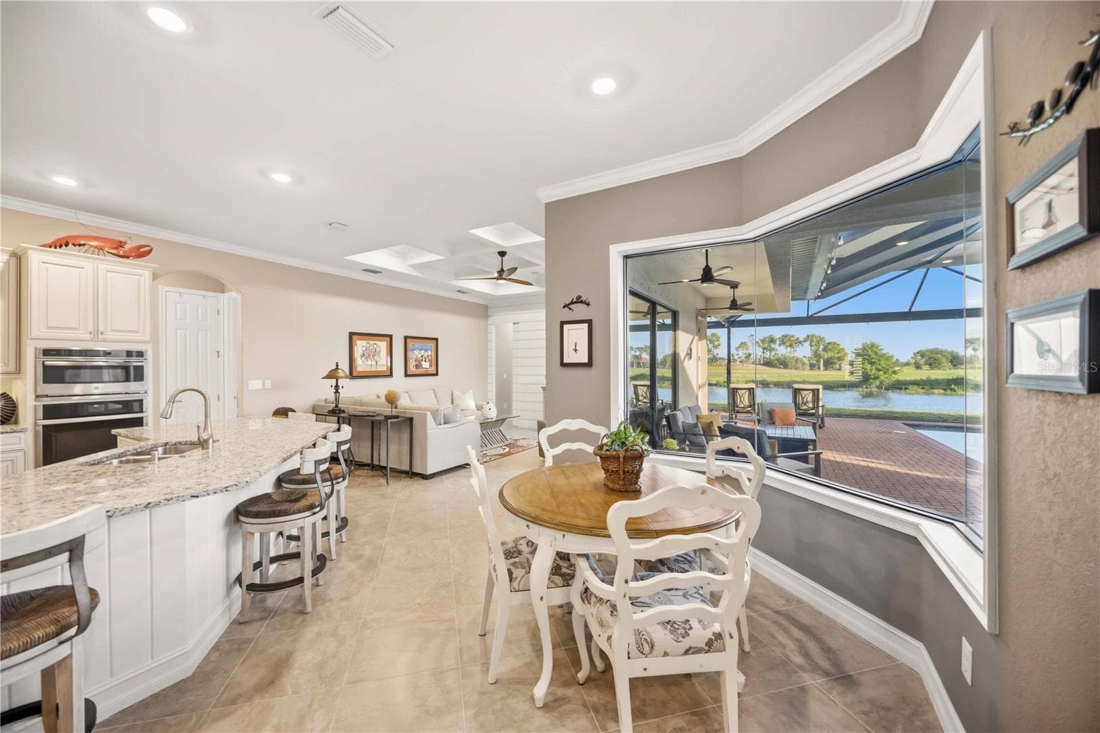 Kitchen and dinette with the aquarium window - 10720 TARFLOWER DR, VENICE
