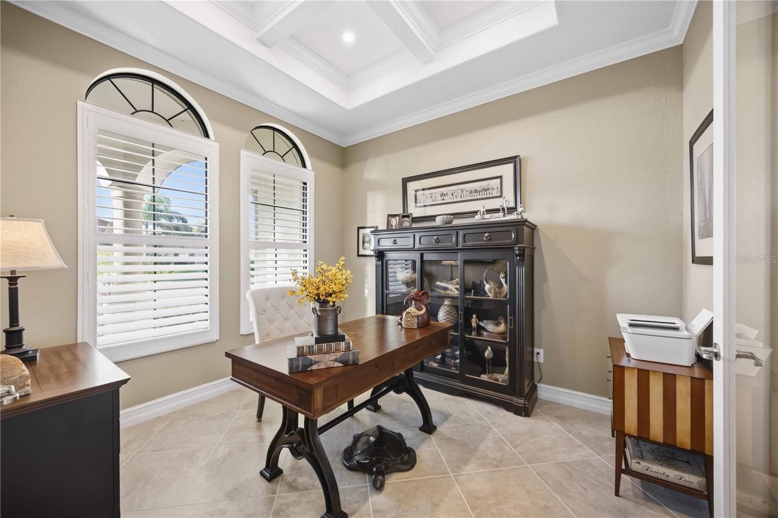 The office is beautiful. Loads of light, plantation shutters throughout, really well done. - 10720 TARFLOWER DR, VENICE