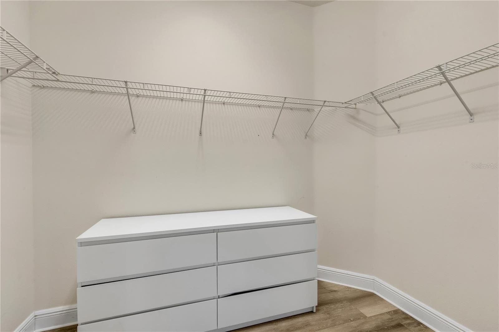 primary walk-in closet - 128 BAUER CIR, DAYTONA BEACH