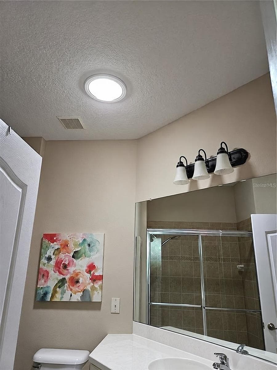Solar Tube in Primary Bathroom - 1215 LYNDHURST GREENS DR #.000, SUN CITY CENTER