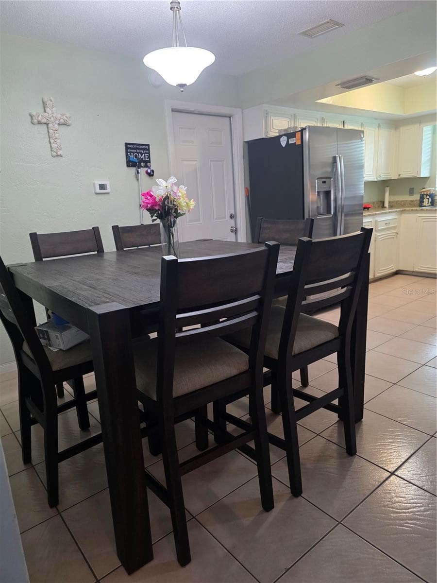 Large enough for those family gatherings or games nights! - 1535 URBANA AVENUE, DELTONA