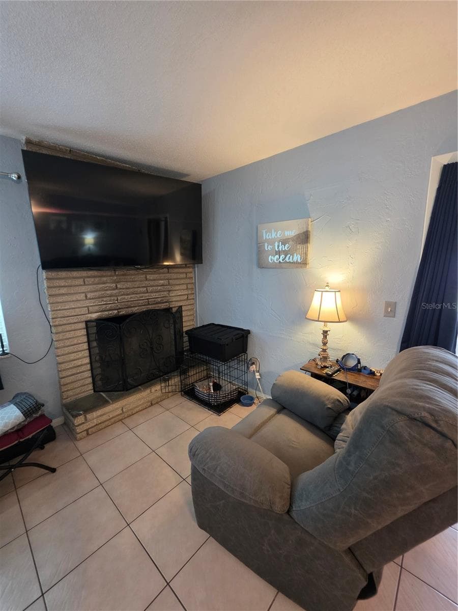 Wood burning fireplace for those occasional chilly Florida nights! - 1535 URBANA AVENUE, DELTONA