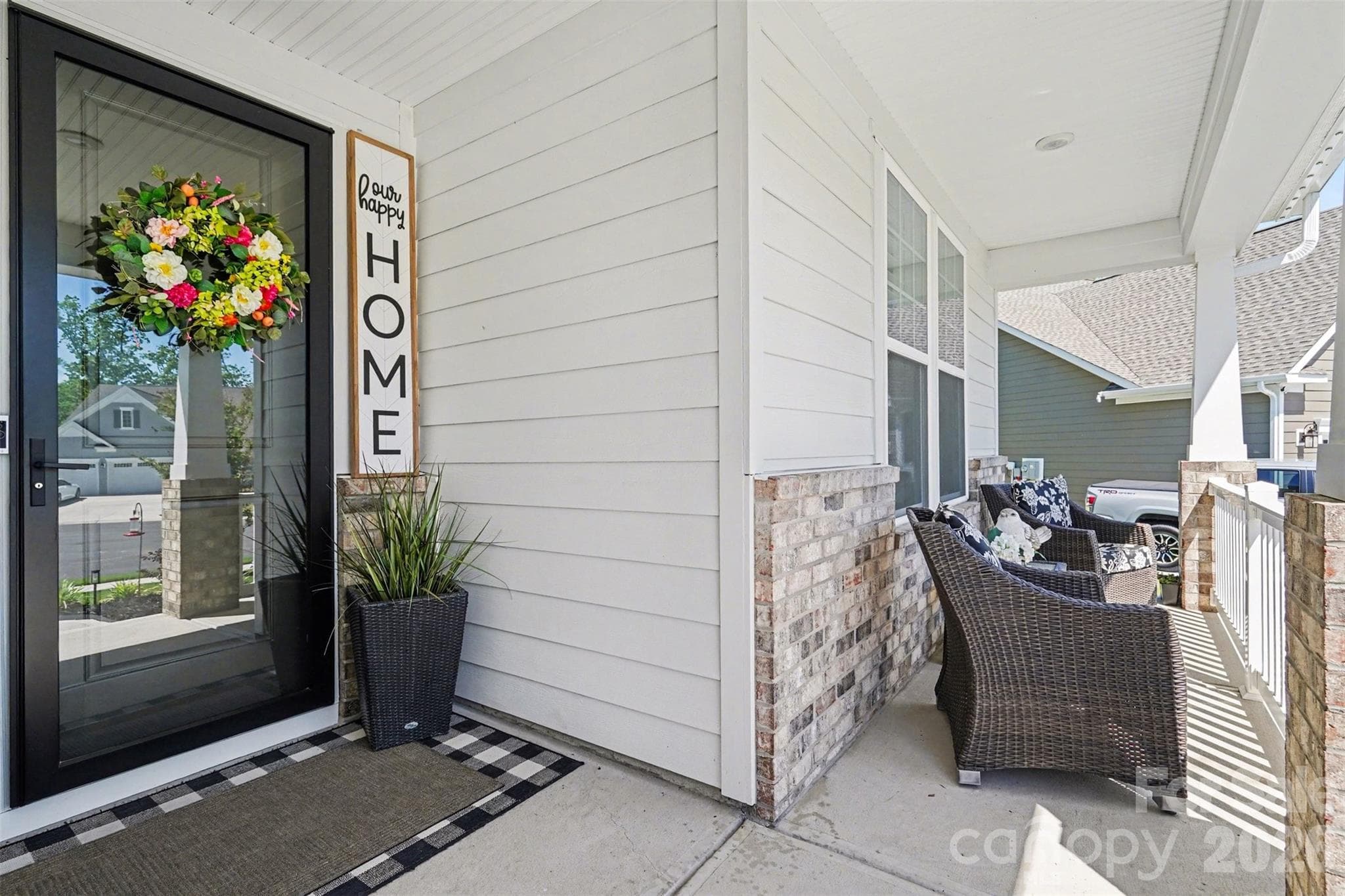Your front-row seat to the neighborhood. Coffee in the morning, a cold drink at sunset. - 8027 Longwaters Court, York