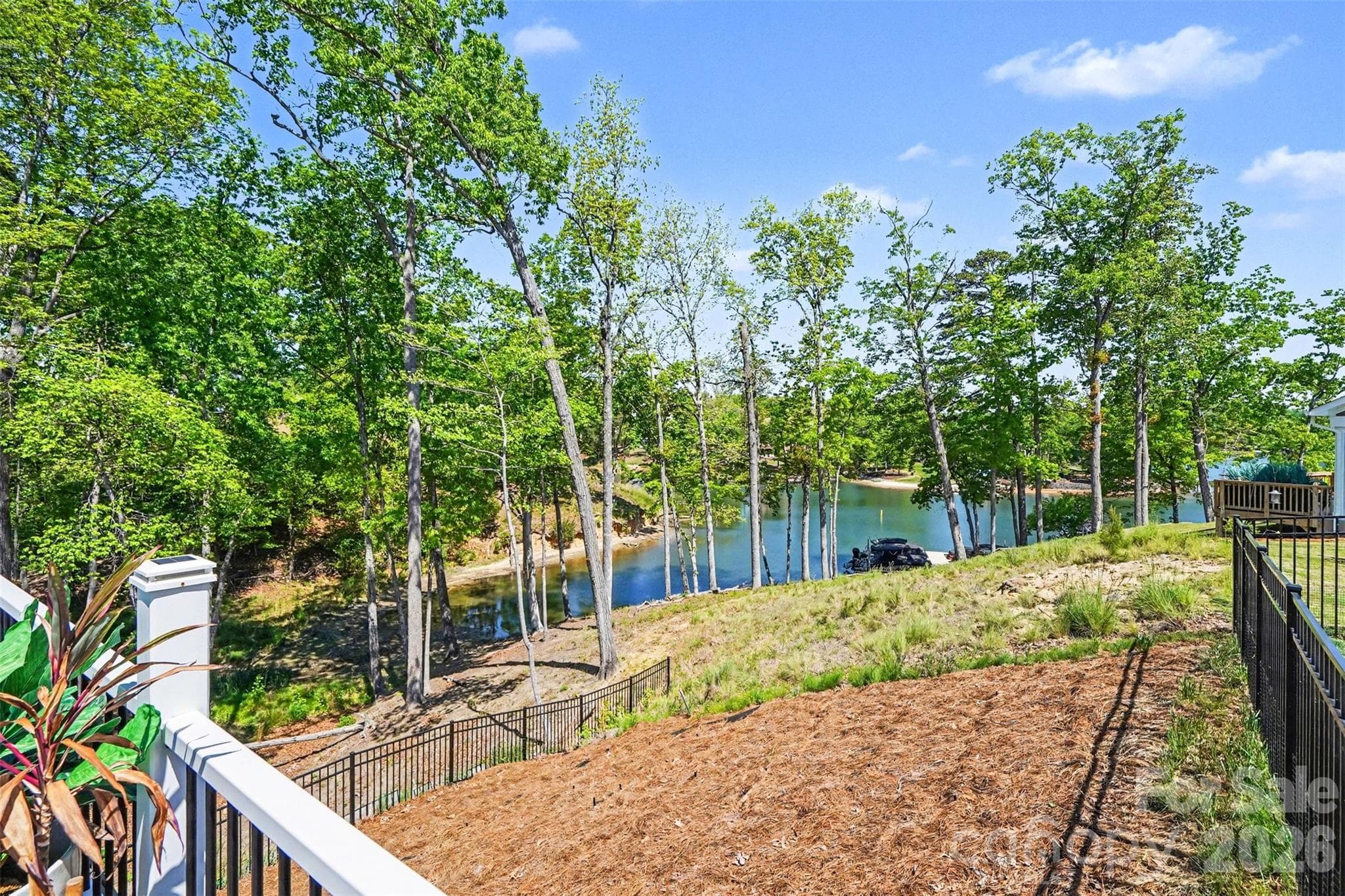 The view from the deck. A quiet Lake Wylie cove that makes the morning coffee taste better. - 8027 Longwaters Court, York