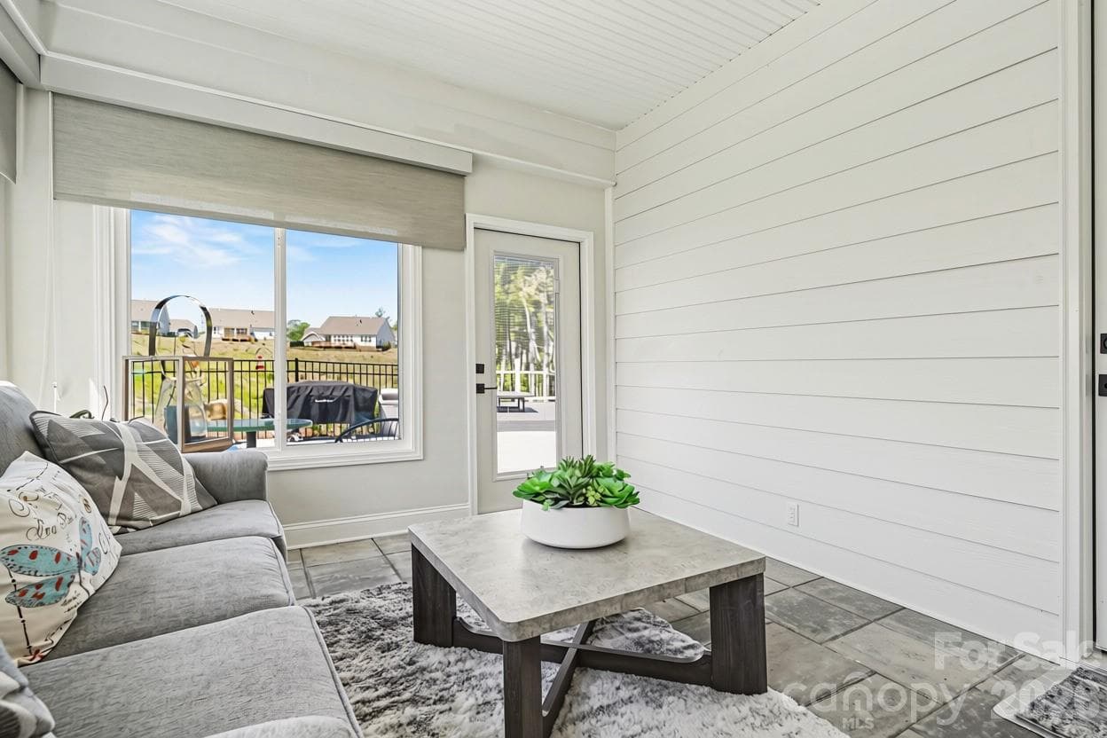 Cozy Sunroom with a door straight out to the deck. - 8027 Longwaters Court, York