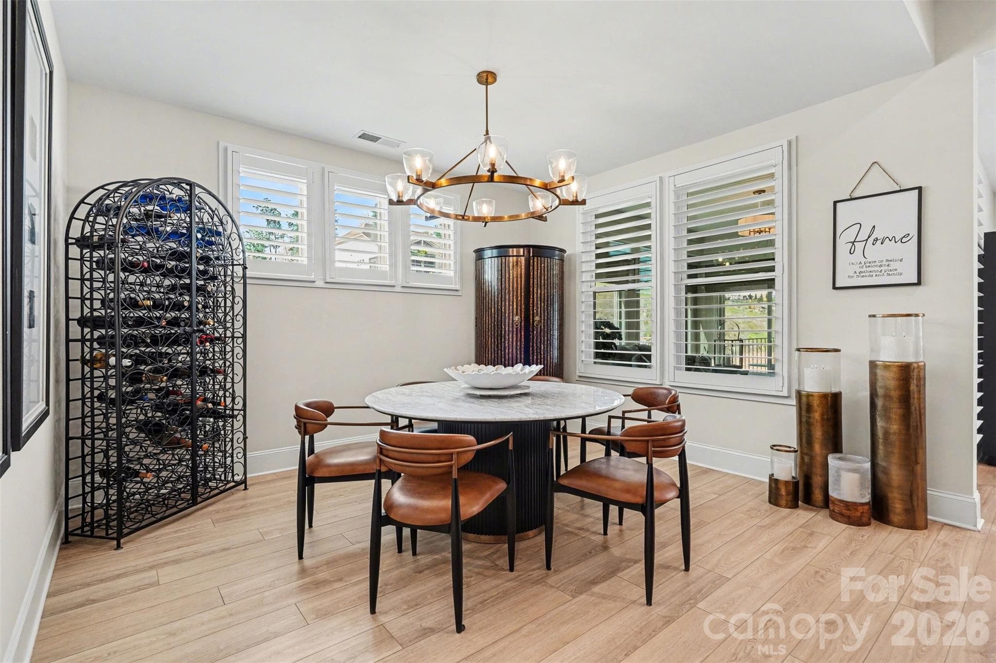 A flexible spot with room to make it yours. A breakfast area, a game table for cards and puzzles, a cozy reading corner, a coffee and wine bar, or a craft or hobby table. Windows bring in plenty of light. - 8027 Longwaters Court, York