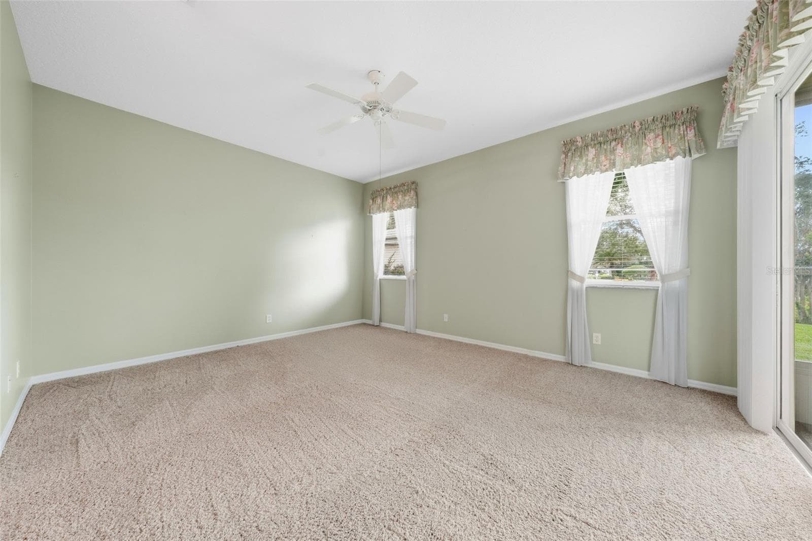 Primary Bedroom - 5596 FREEPORT DR, TAVARES