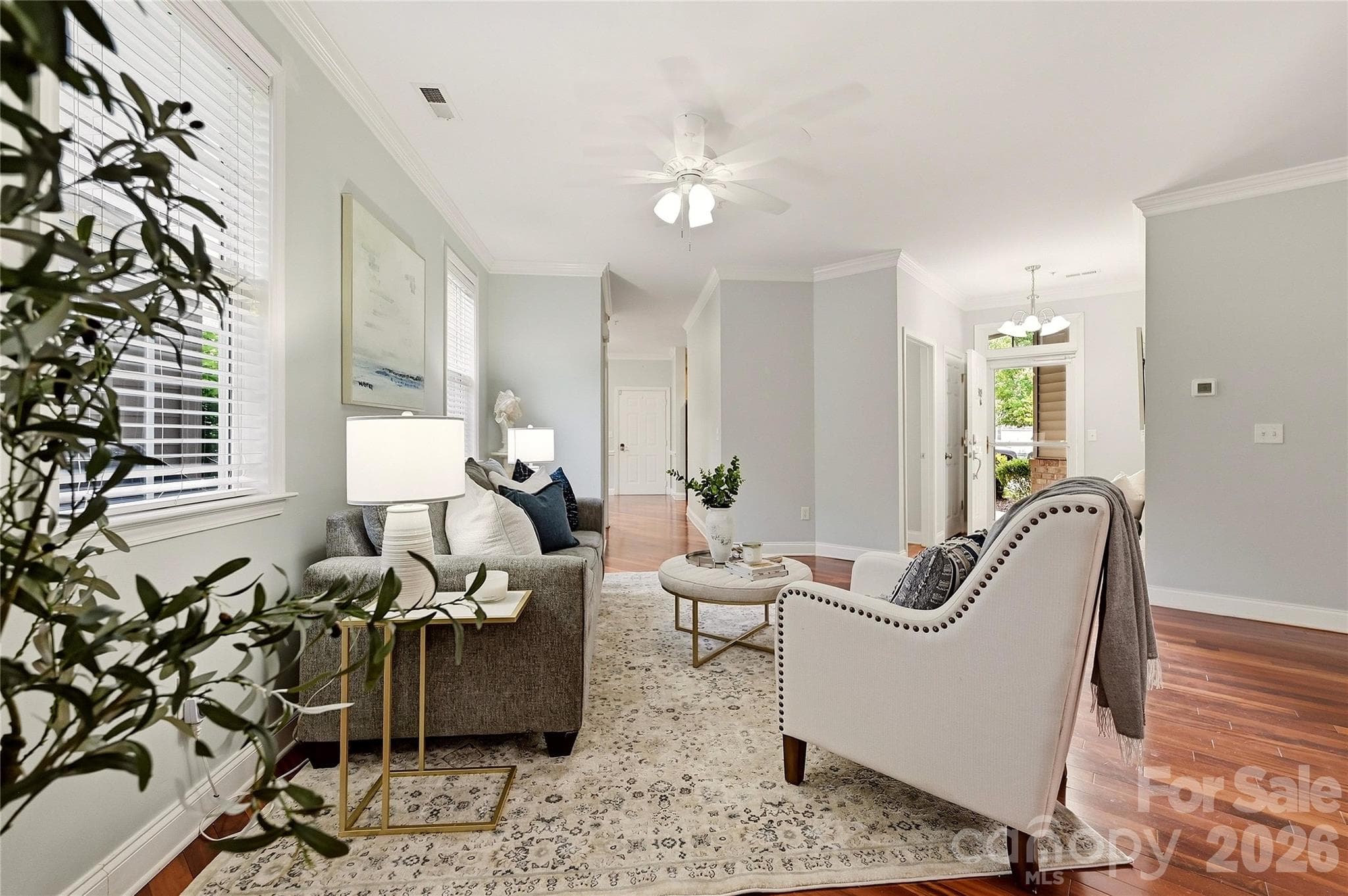 Flexible sitting or dining area provides additional living space with hardwood floors and abundant natural light. - 9009 Rosalyn Glen Road, Cornelius