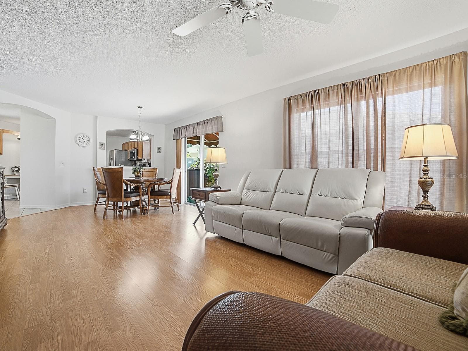 Main living area with view to dining and kitchen - 484 AINTREE LN, THE VILLAGES