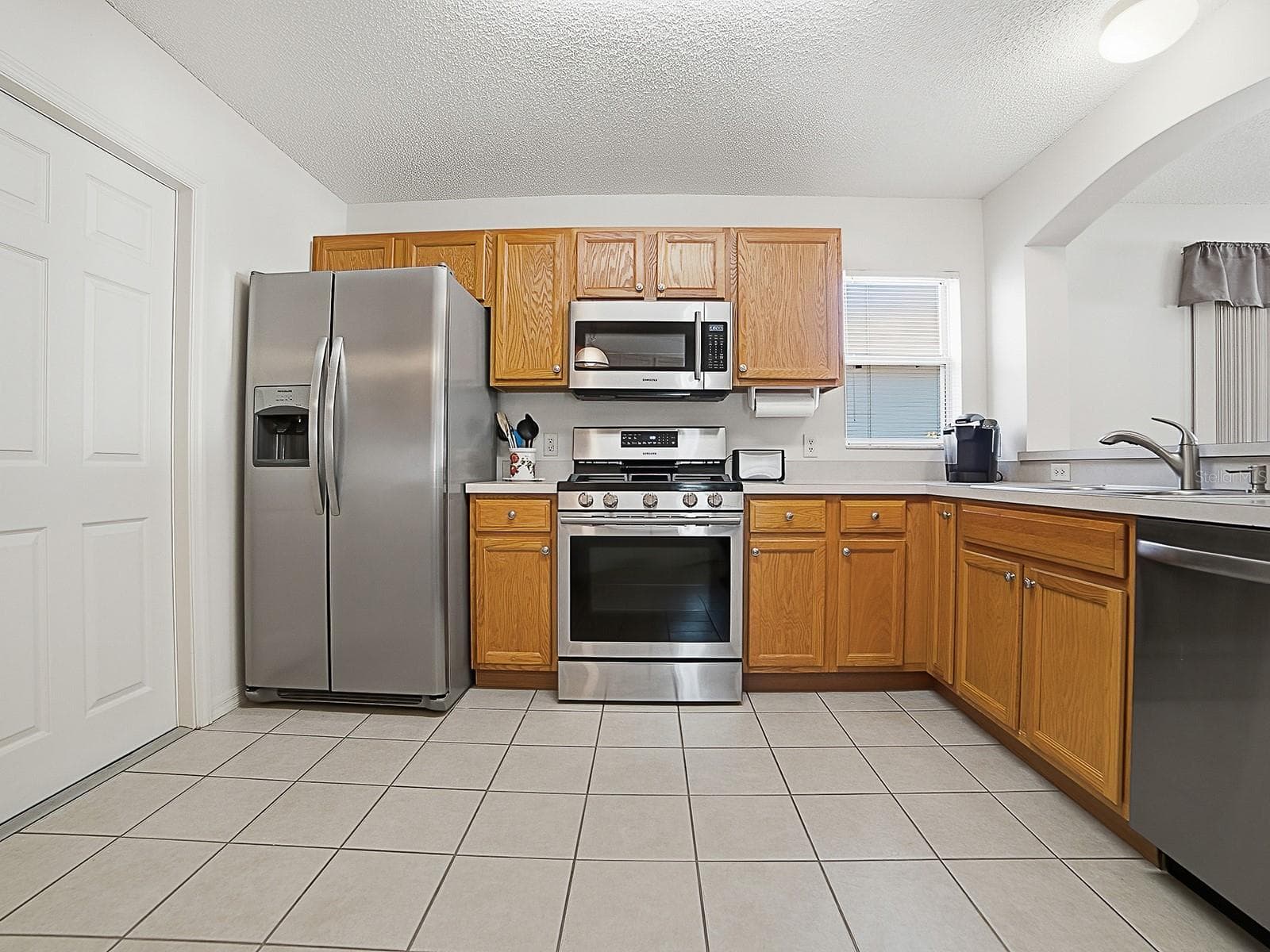 Newer stainless steel appliances - 484 AINTREE LN, THE VILLAGES