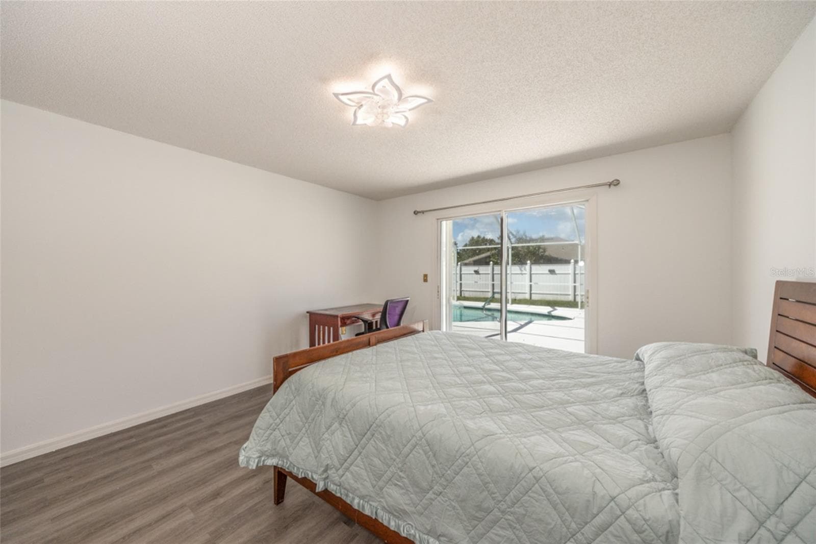 plenty of room for 2 dressers in this primary bedroom - 11 LANCASTER LN, PALM COAST
