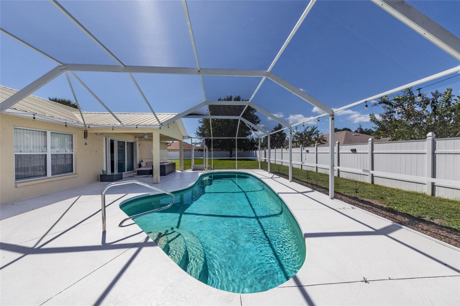 check out the unique shape of the pool - 11 LANCASTER LN, PALM COAST