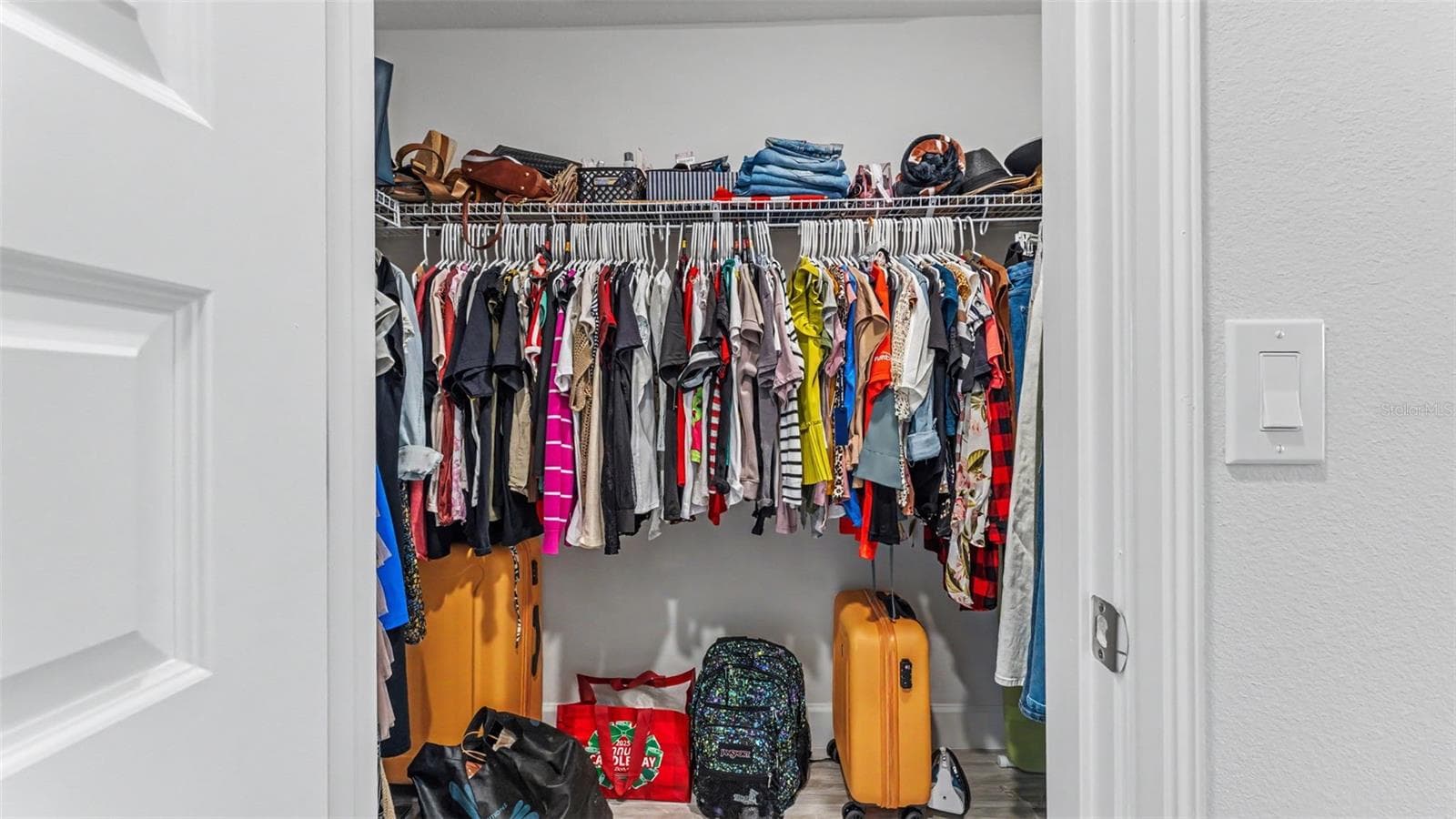 Primary suite two walk in closets. - 5292 TENNESSEE RIDGE CT, AUBURNDALE