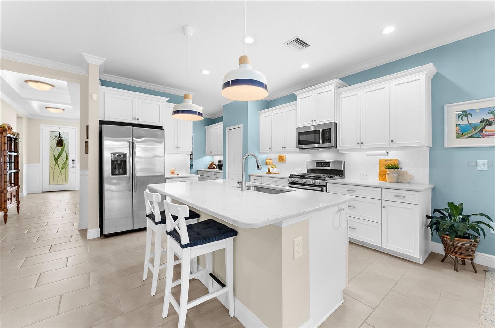 Kitchen is incredible with extra butler pantry in the nook next to the refrigerator - 208 CAPRIANA CT, NOKOMIS