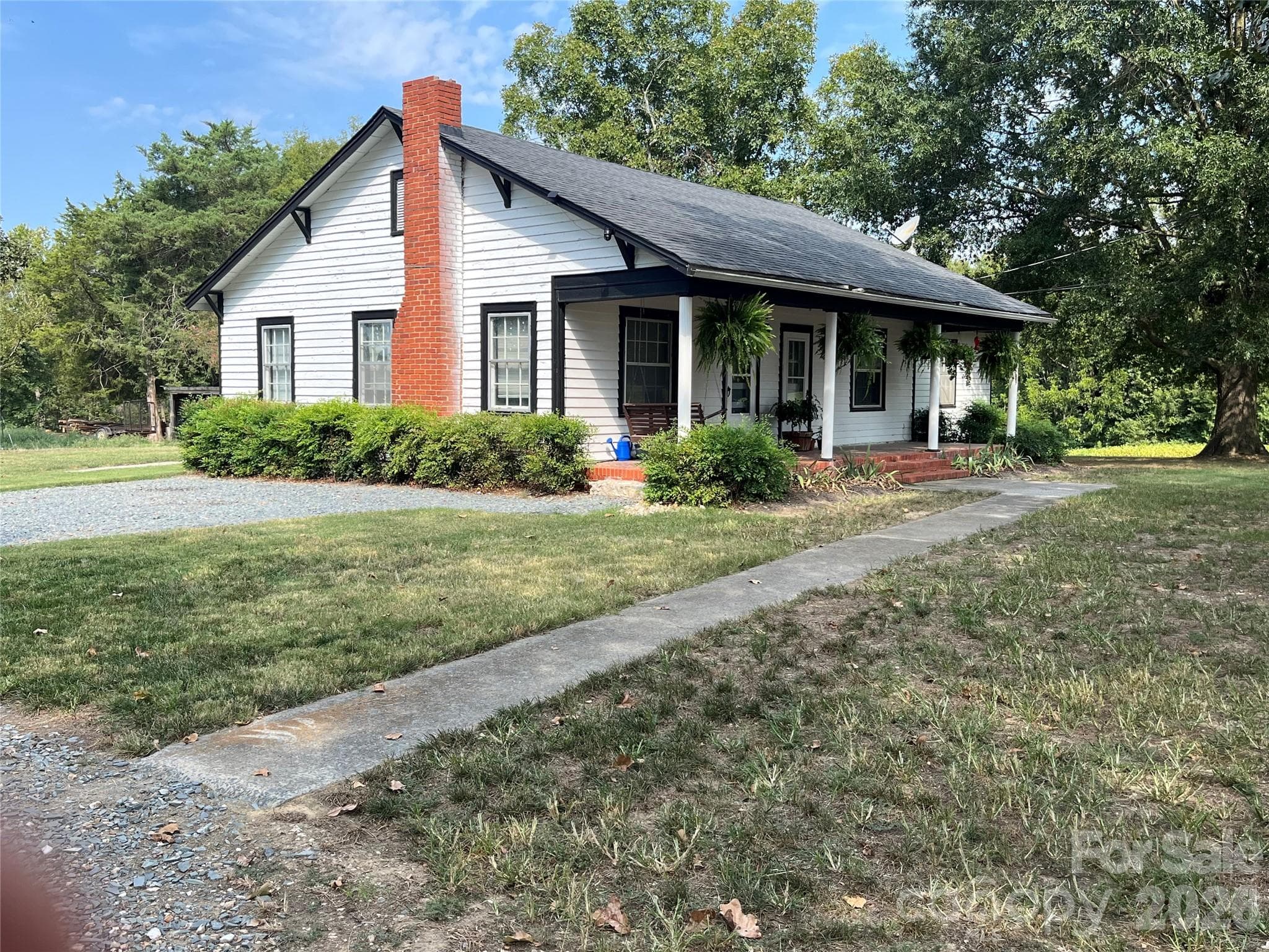 Side view of property - house built in 1945 - 5810 Wolf Pond Road, Monroe