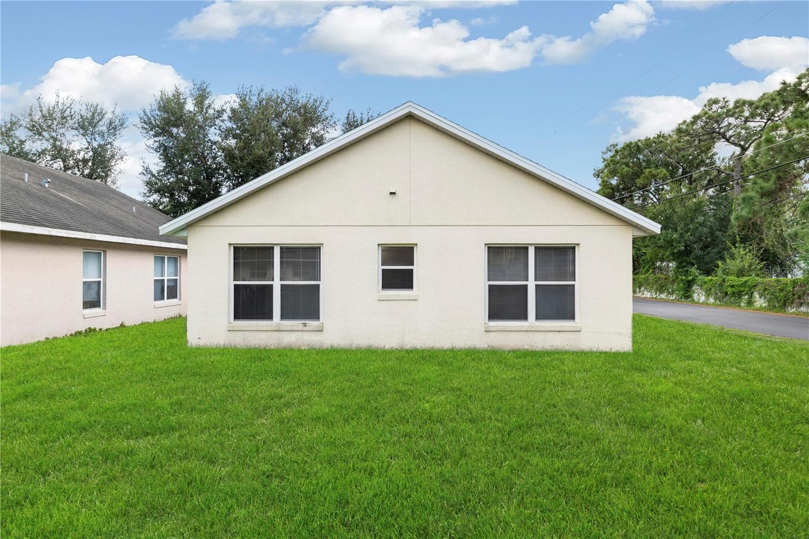 Back exterior - 8503 PLUMERIA AVE, ORLANDO
