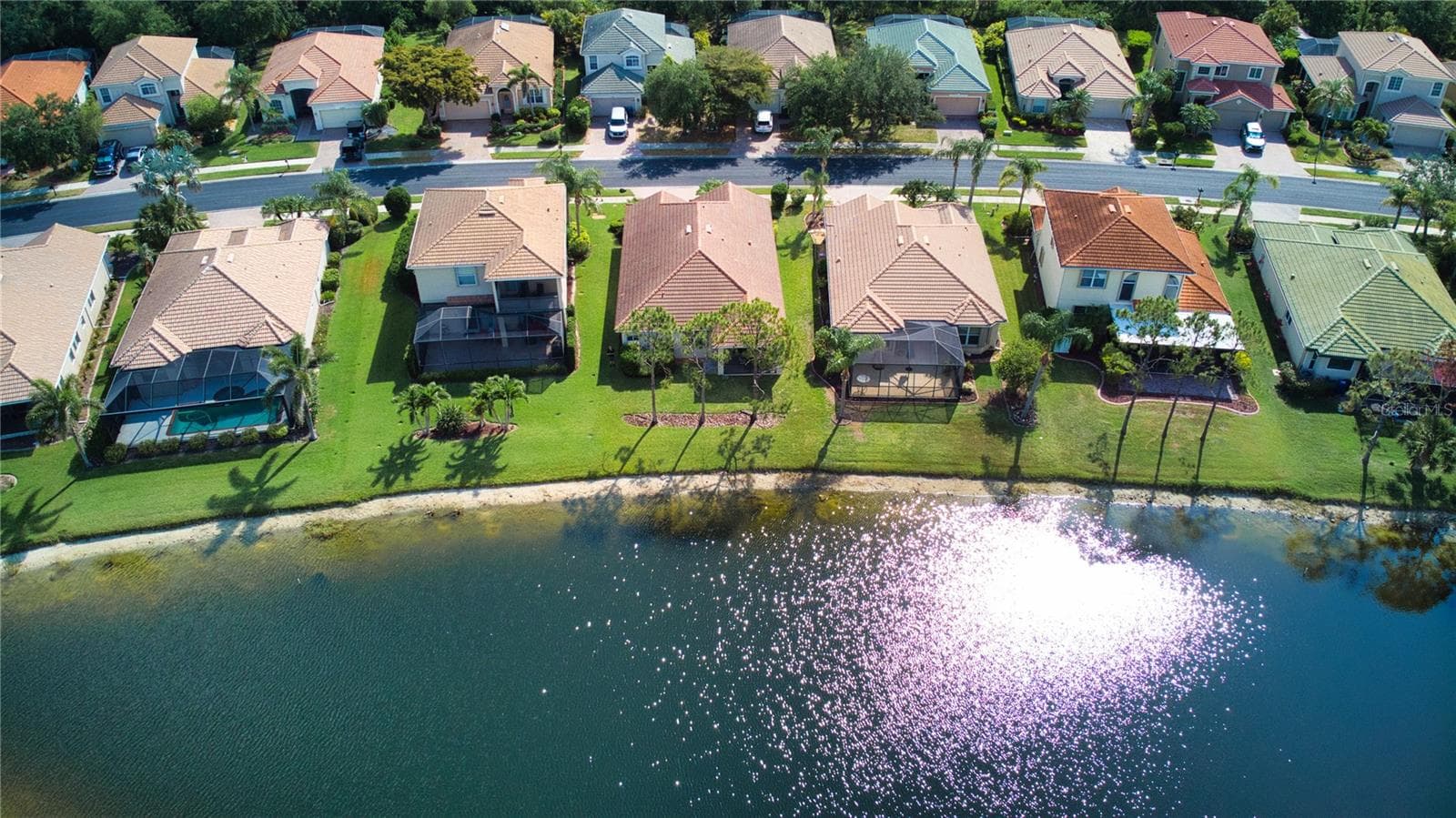 Aerial view lake side - 11504 DANCING RIVER DR, VENICE
