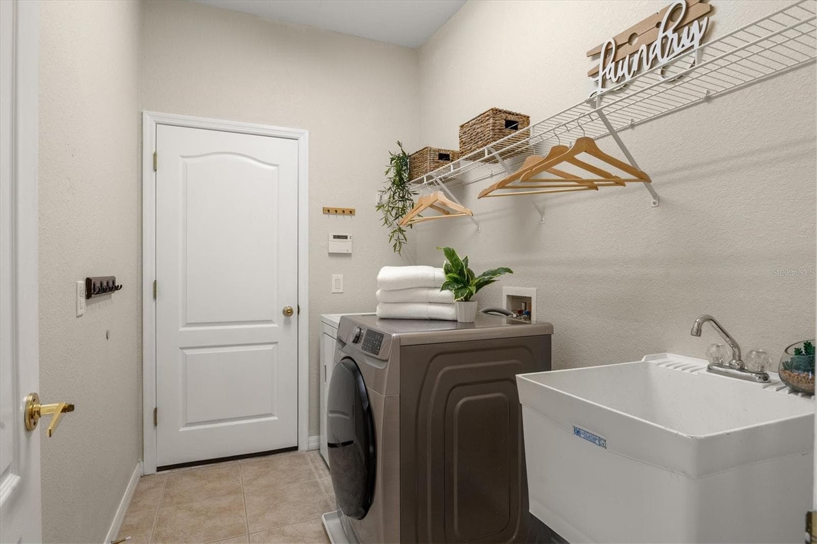 Laundry room - 11504 DANCING RIVER DR, VENICE