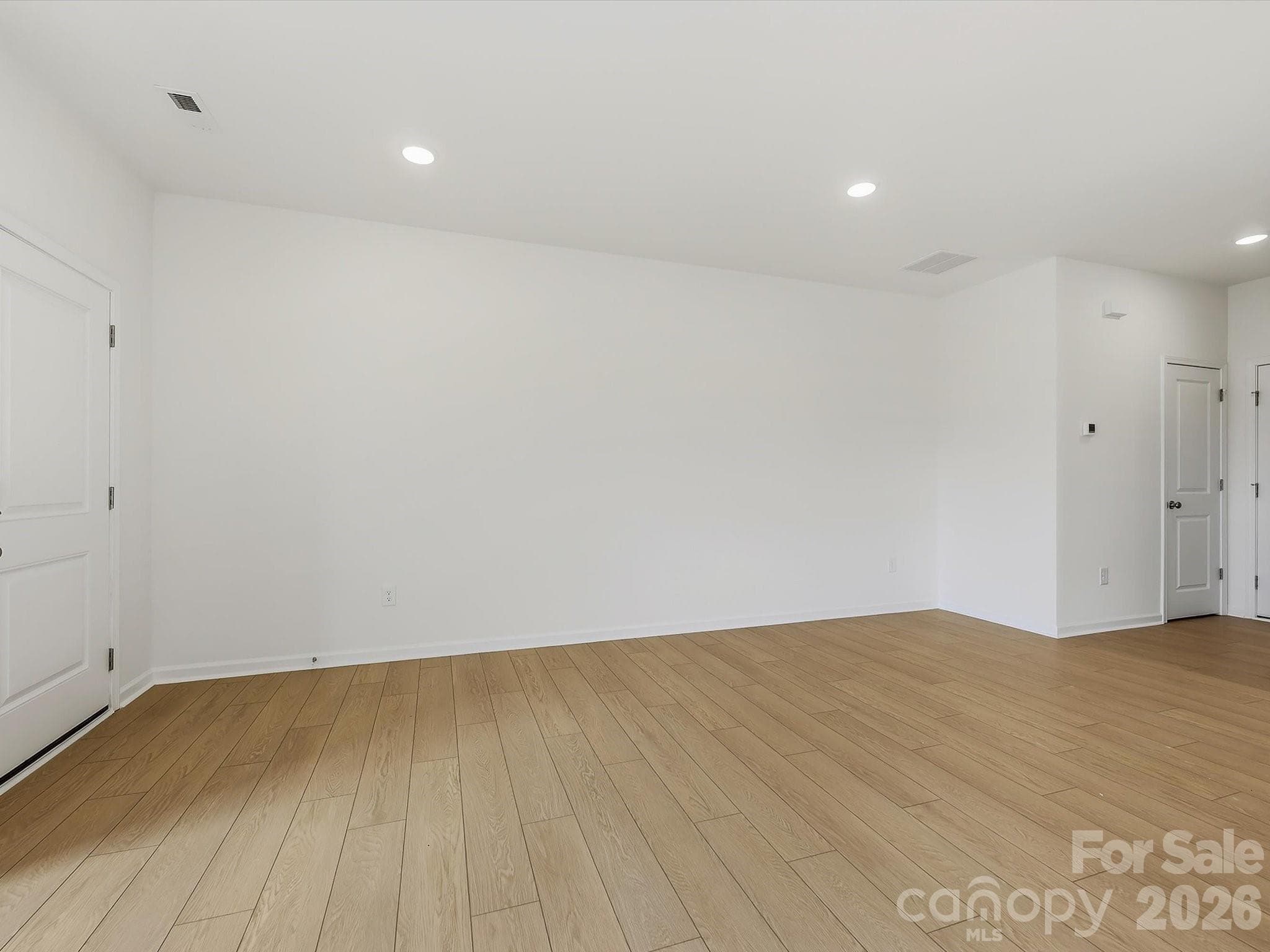 Large Living Room on Main Level - 6613 Fire Lily Lane, Charlotte