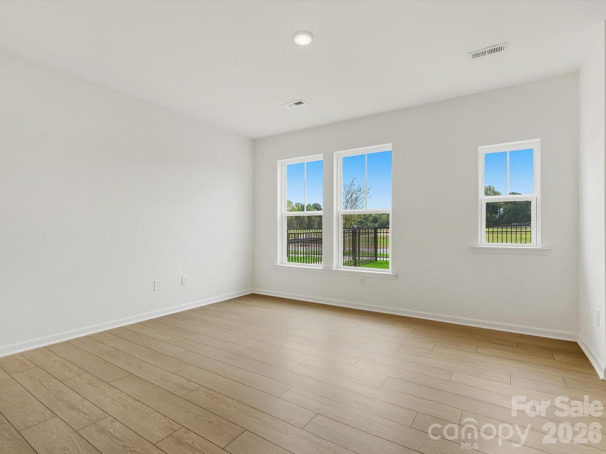 Spacious Living Room with an Abundance of Natural Light - 6613 Fire Lily Lane, Charlotte