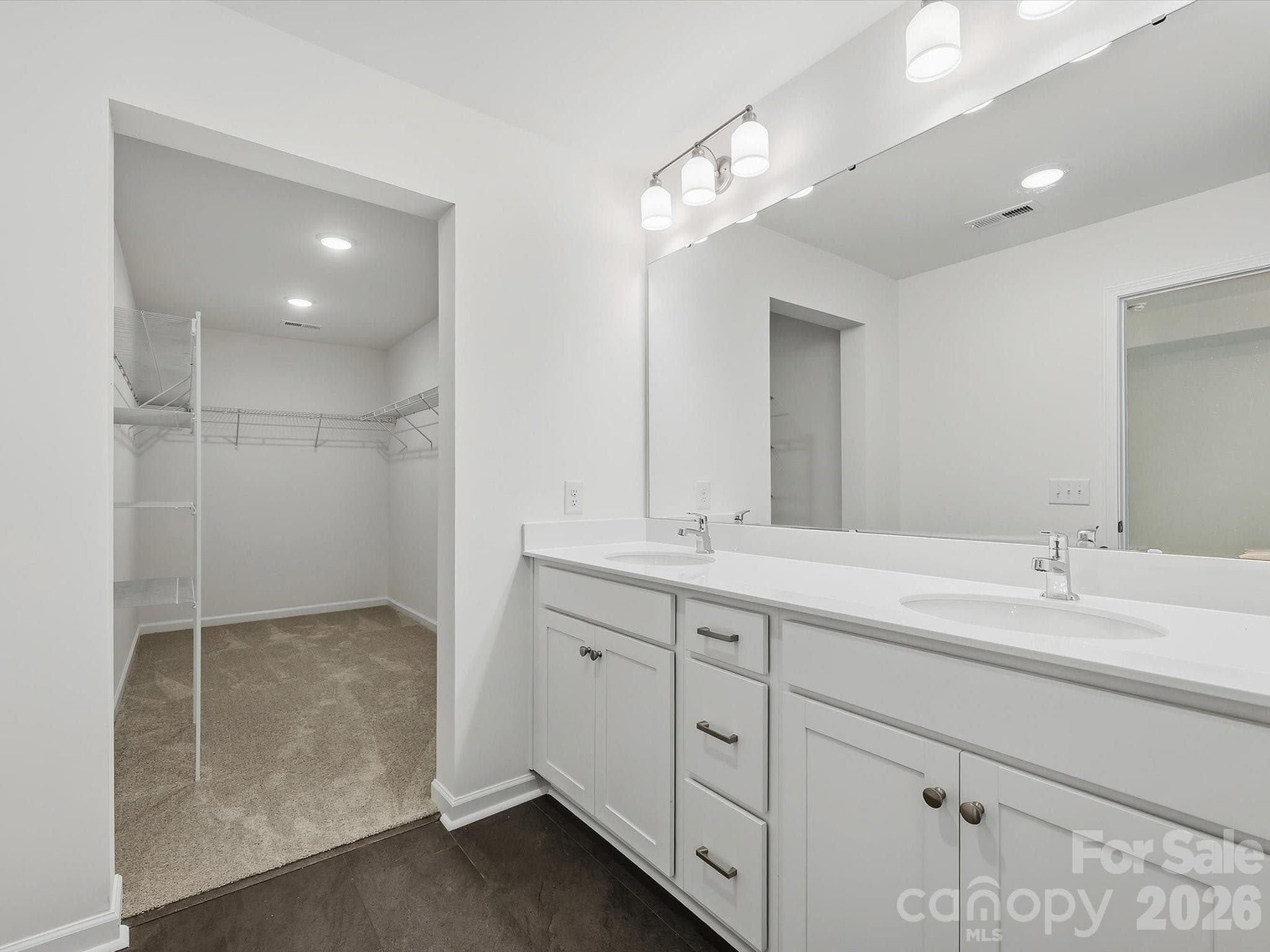Owner's Bathroom Leading to an Enormous Owner's Closet - 6613 Fire Lily Lane, Charlotte