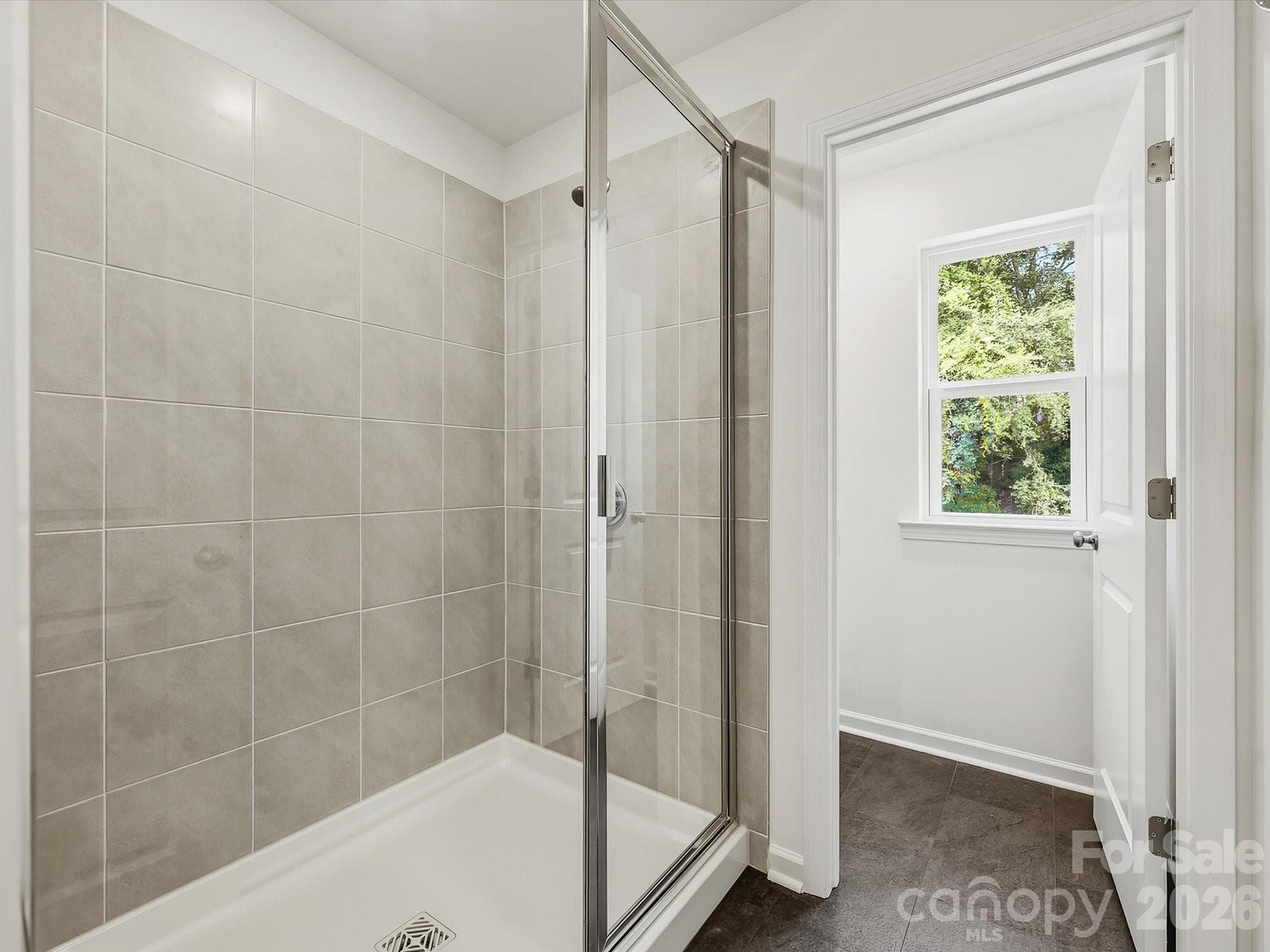 Expansive Owner's Shower - 6613 Fire Lily Lane, Charlotte