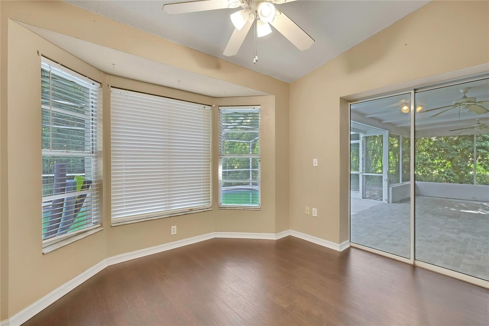 Bright breakfast nook with bay windows and lanai access - 1097 FLORIAN WAY, SPRING HILL