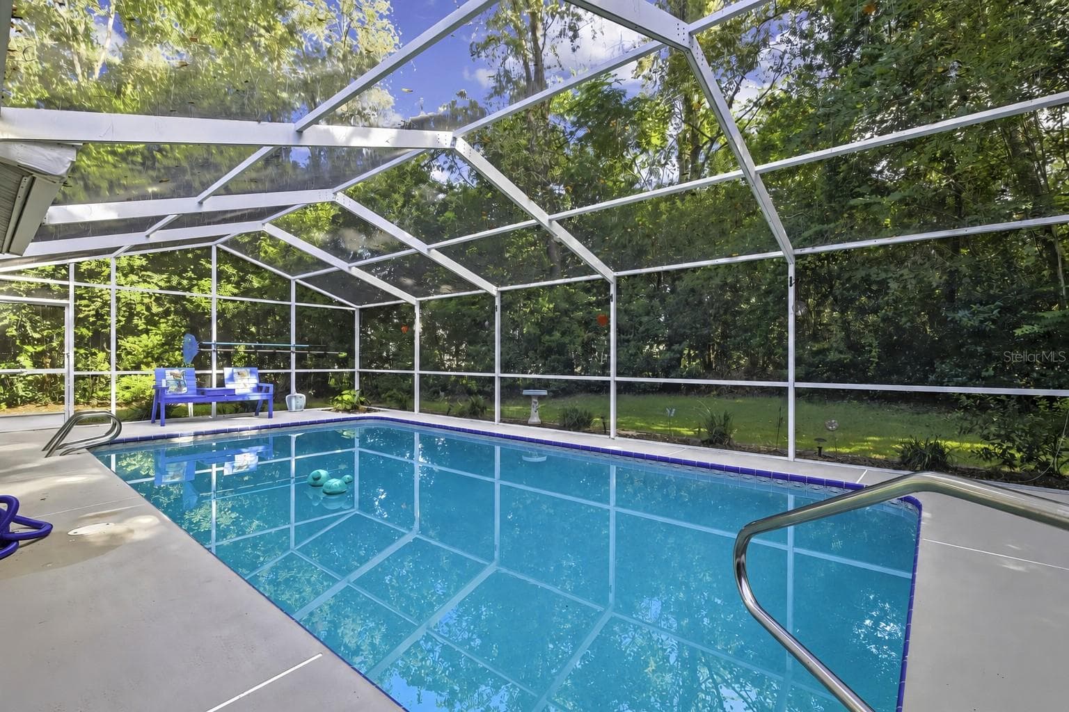 Swimming pool within a full screened enclosure - 1097 FLORIAN WAY, SPRING HILL