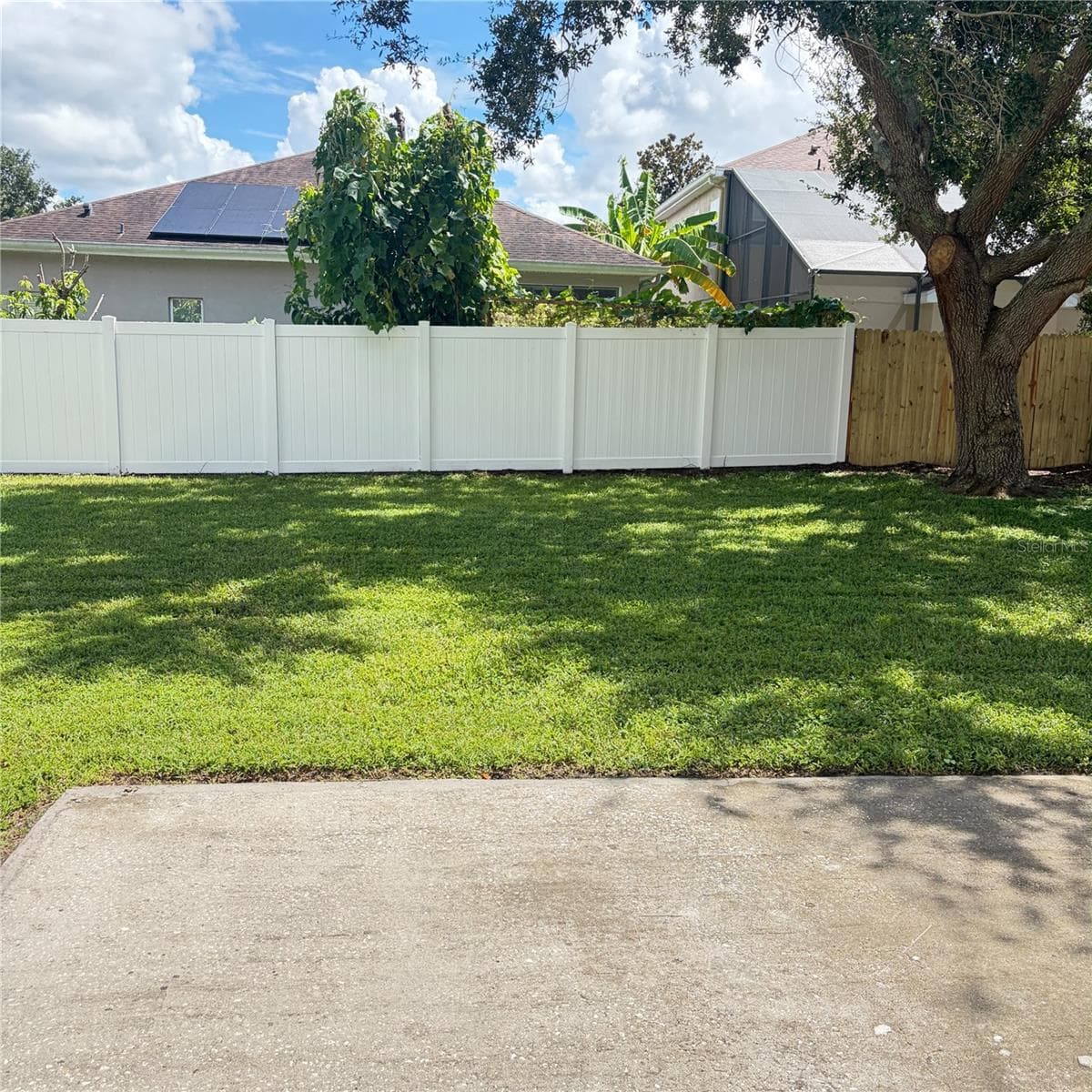 Backyard right side - 13621 TETHERLINE TRL, ORLANDO