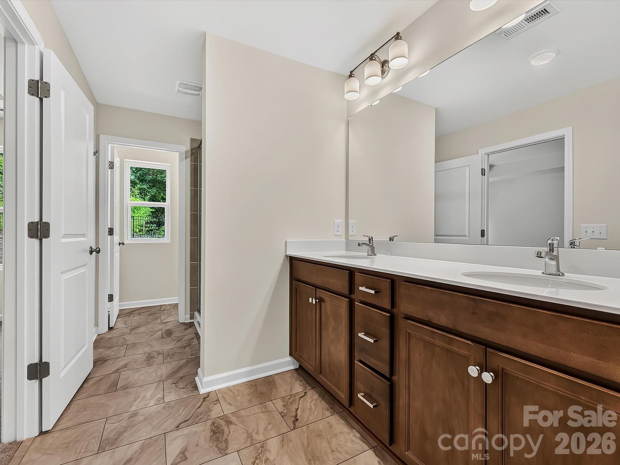 Spacious Owner's Bathroom with Double Sink Vanity - Charlotte
