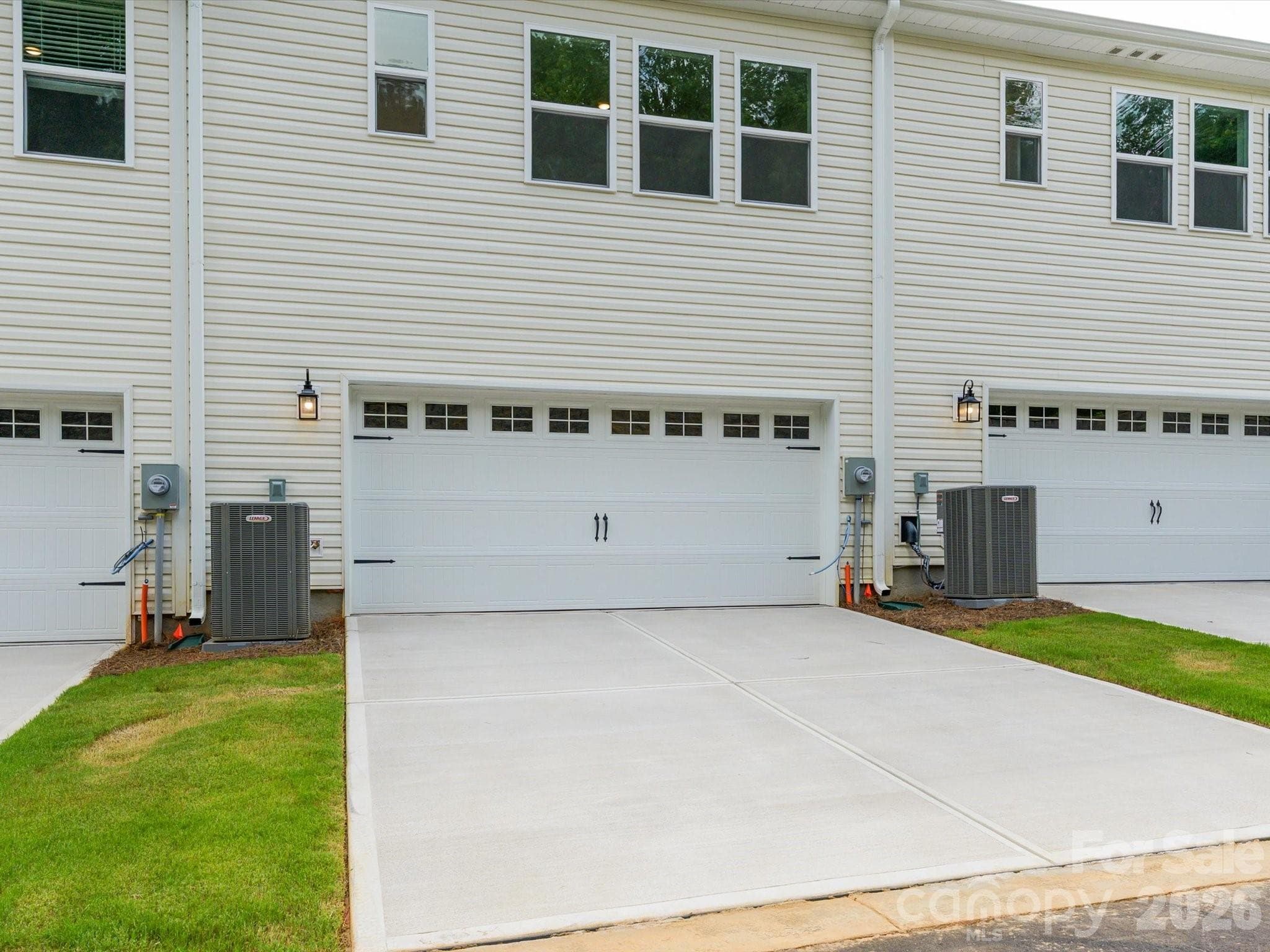 2 car side-by-side Rear Garage and 20 ft. Driveway Offering 4 Parking Spaces for Both Home Owners and Guests - Charlotte