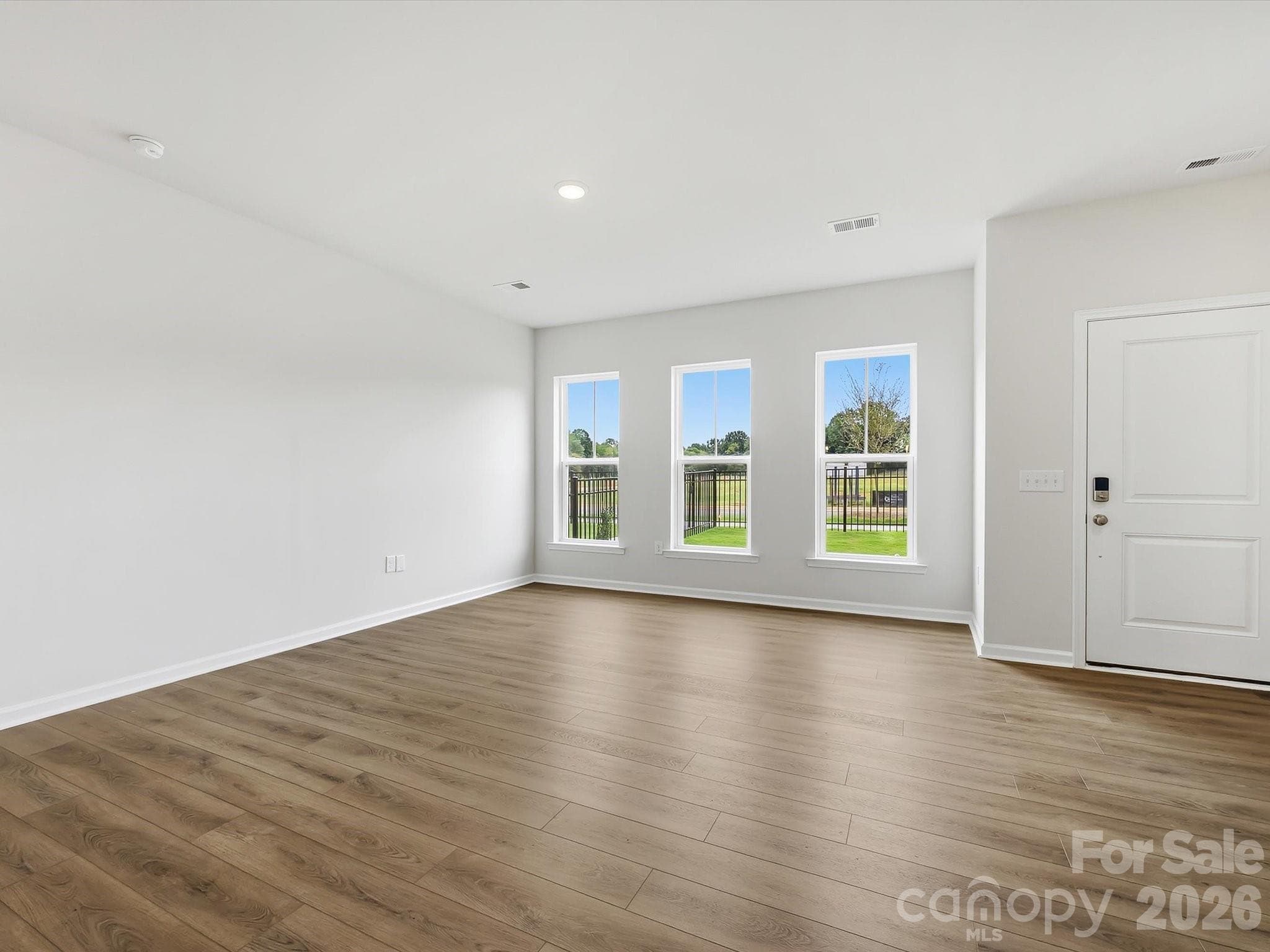 Living Room with an Abundance of Natural Light - 6609 Fire Lily Lane, Charlotte