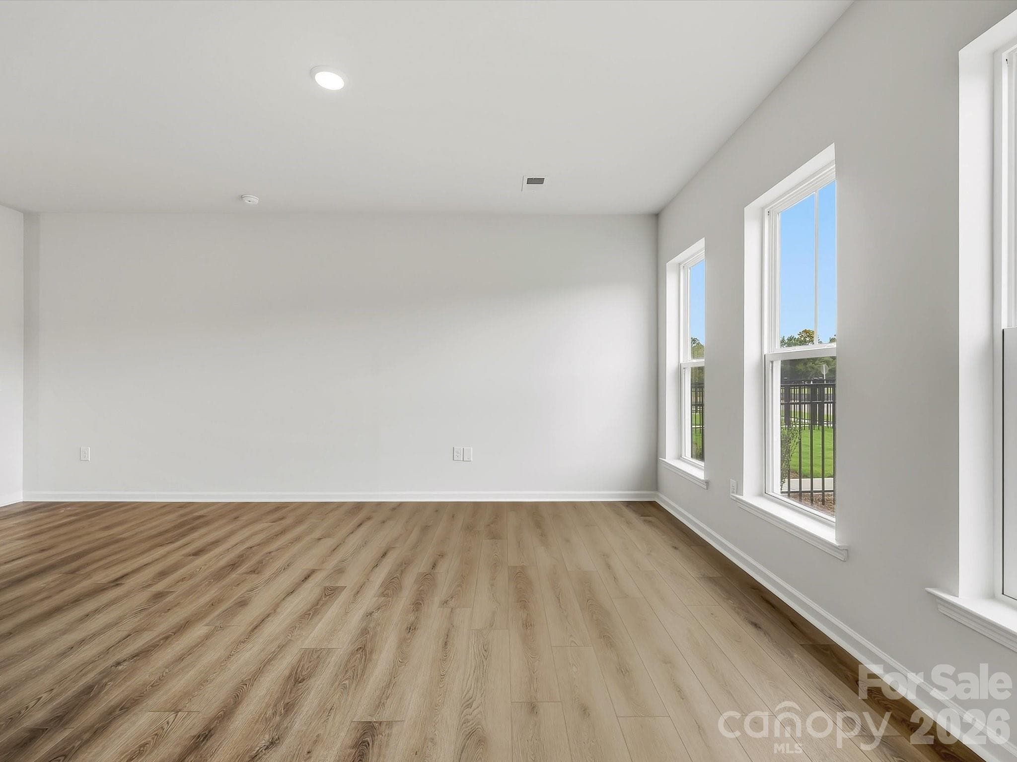Living Room with an Abundance of Natural Light - 6609 Fire Lily Lane, Charlotte