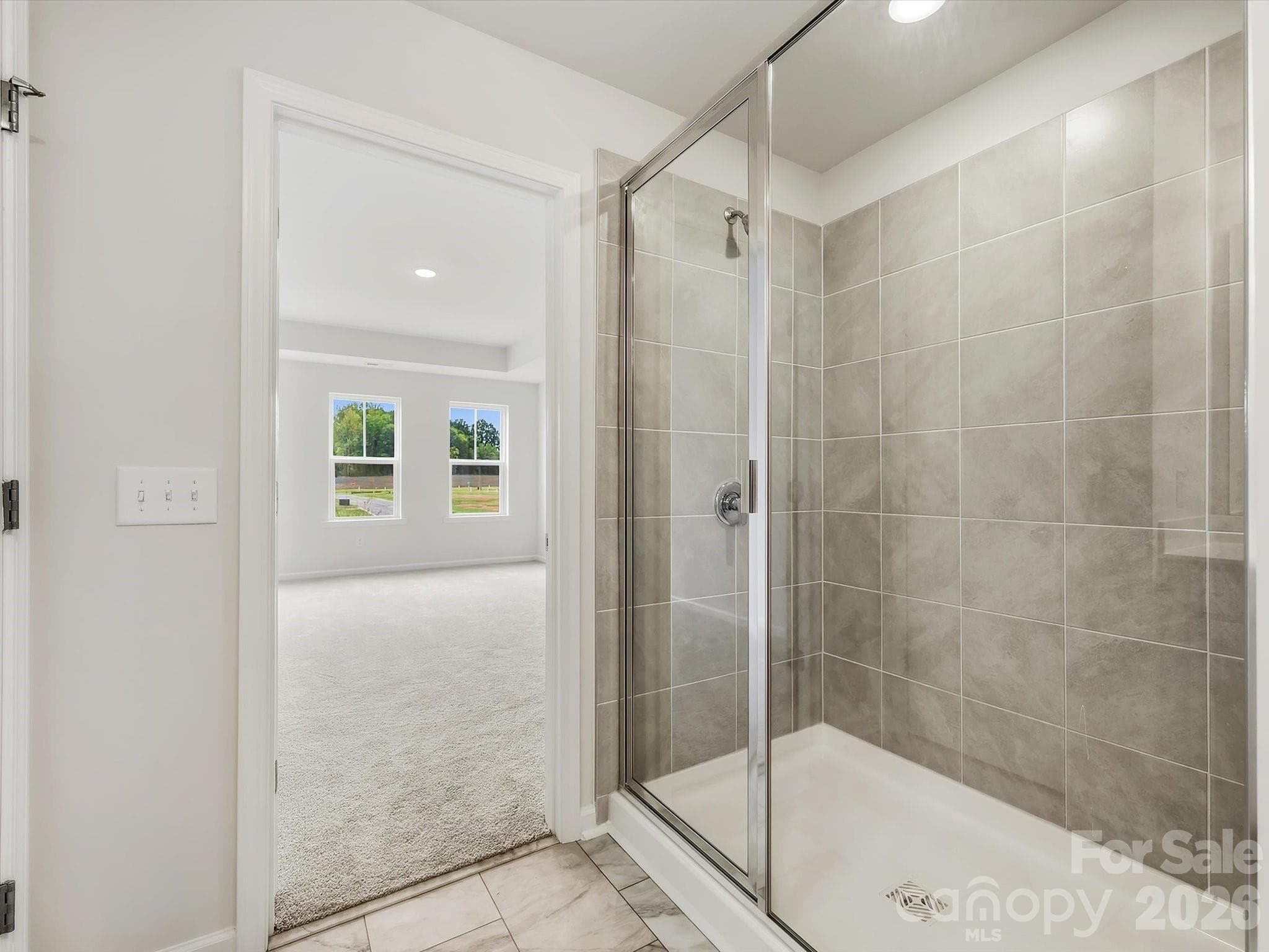 Owner's Bathroom Shower Leading Back into the Owner's Suite - 6609 Fire Lily Lane, Charlotte