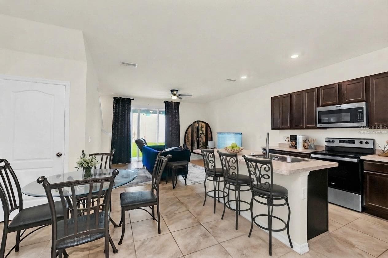 Virtually staged-partially - 1401 YELLOW FINCH DR, DAVENPORT