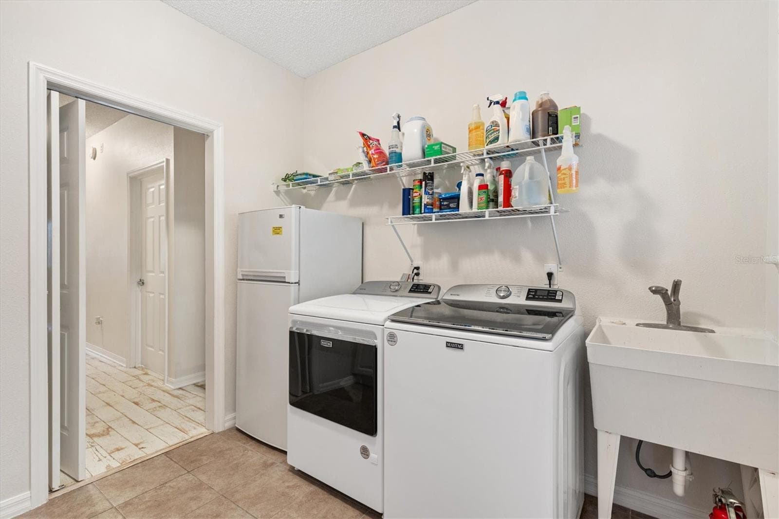 1st Floor-Inside Laundry Room w/ Utility Sink & Refrigerator - 1212 AVENIDA DE LAS CASAS #0, THE VILLAGES