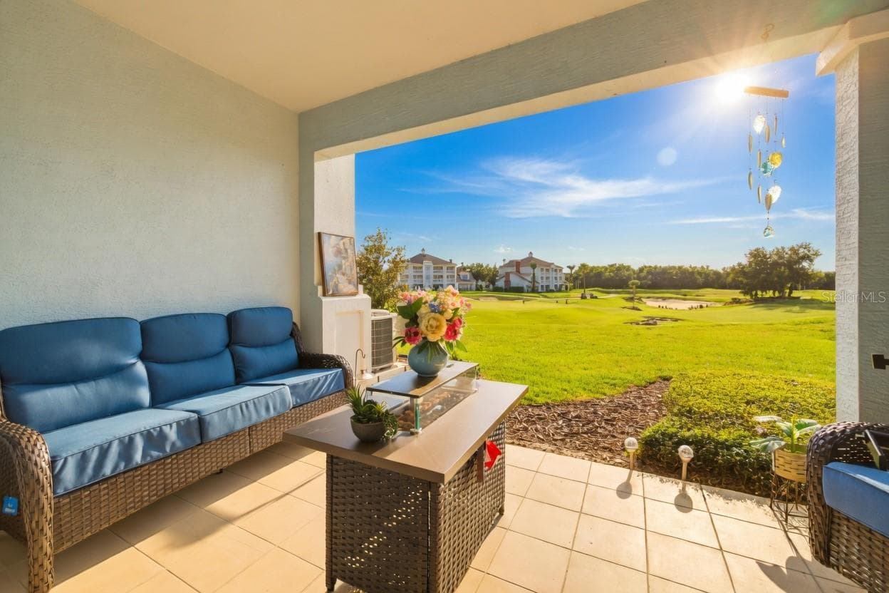 Living Room Balcony - 7655 HERITAGE CROSSING WAY #102, KISSIMMEE