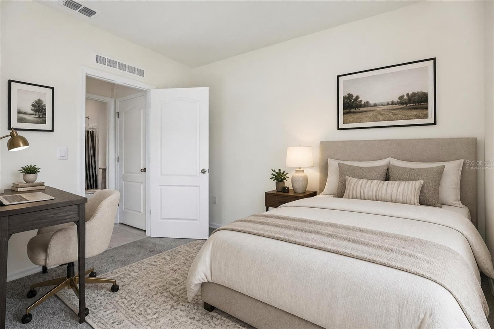Virtually staged Bedroom 2 on first floor - 2945 ELIO HAMMOCK DR, HARMONY