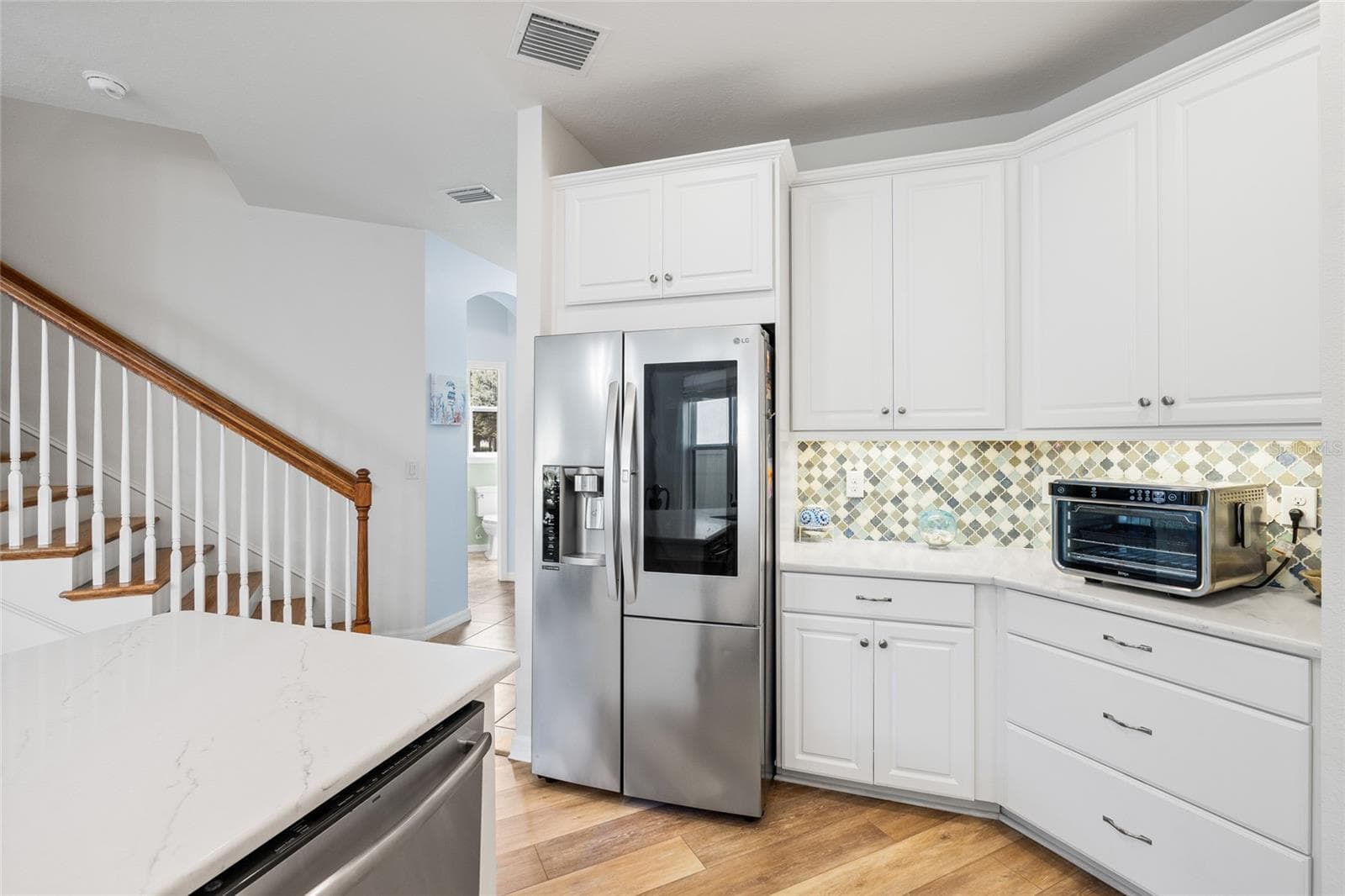 Kitchen looking to entry way. - 8519 ARABELLA LN, SEMINOLE