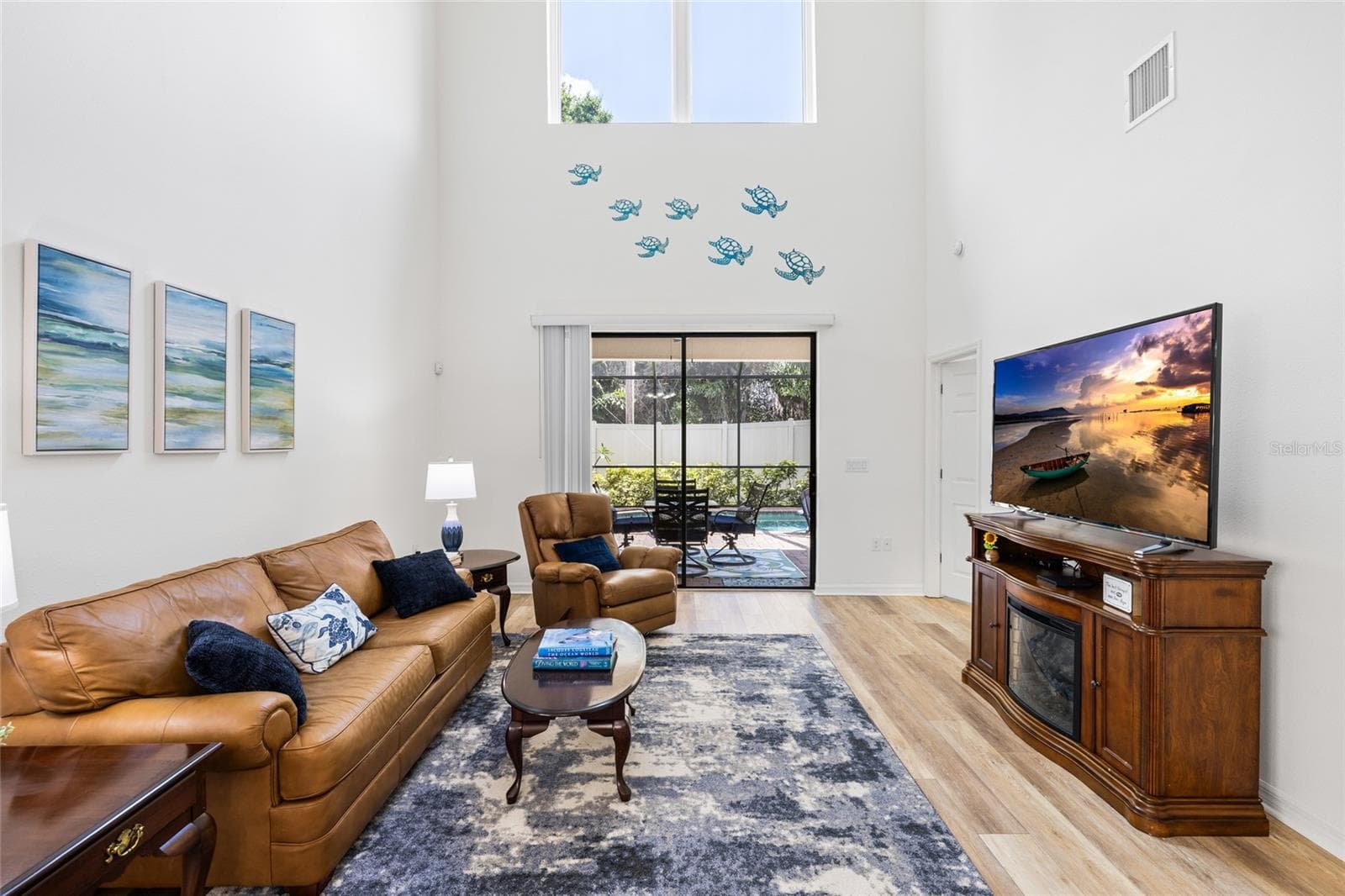 Great room with soaring ceilings, and lots of natural light. - 8519 ARABELLA LN, SEMINOLE