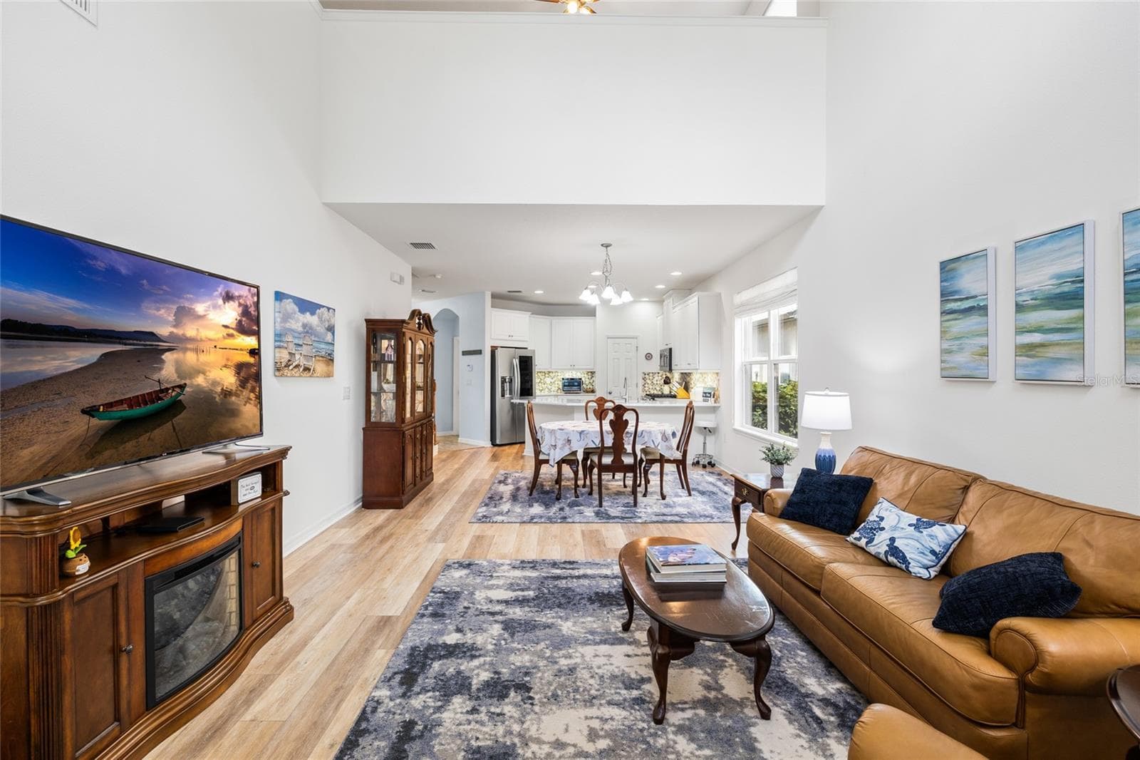 Great room, dining area and kitchen. - 8519 ARABELLA LN, SEMINOLE