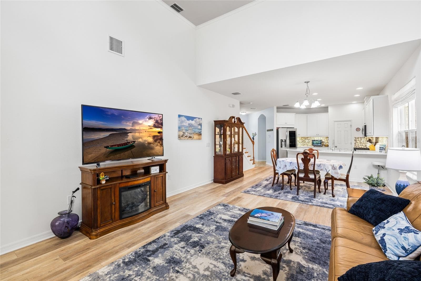 Great room, dining area and kitchen - 8519 ARABELLA LN, SEMINOLE