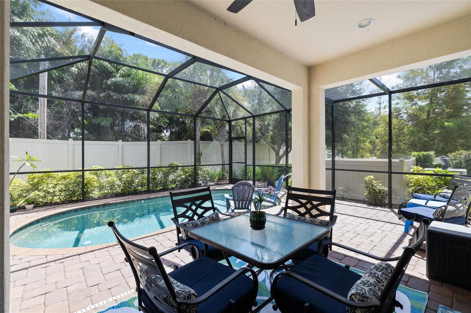 Covered porch area over looking salt water pool. Fully enclosed screen. - 8519 ARABELLA LN, SEMINOLE