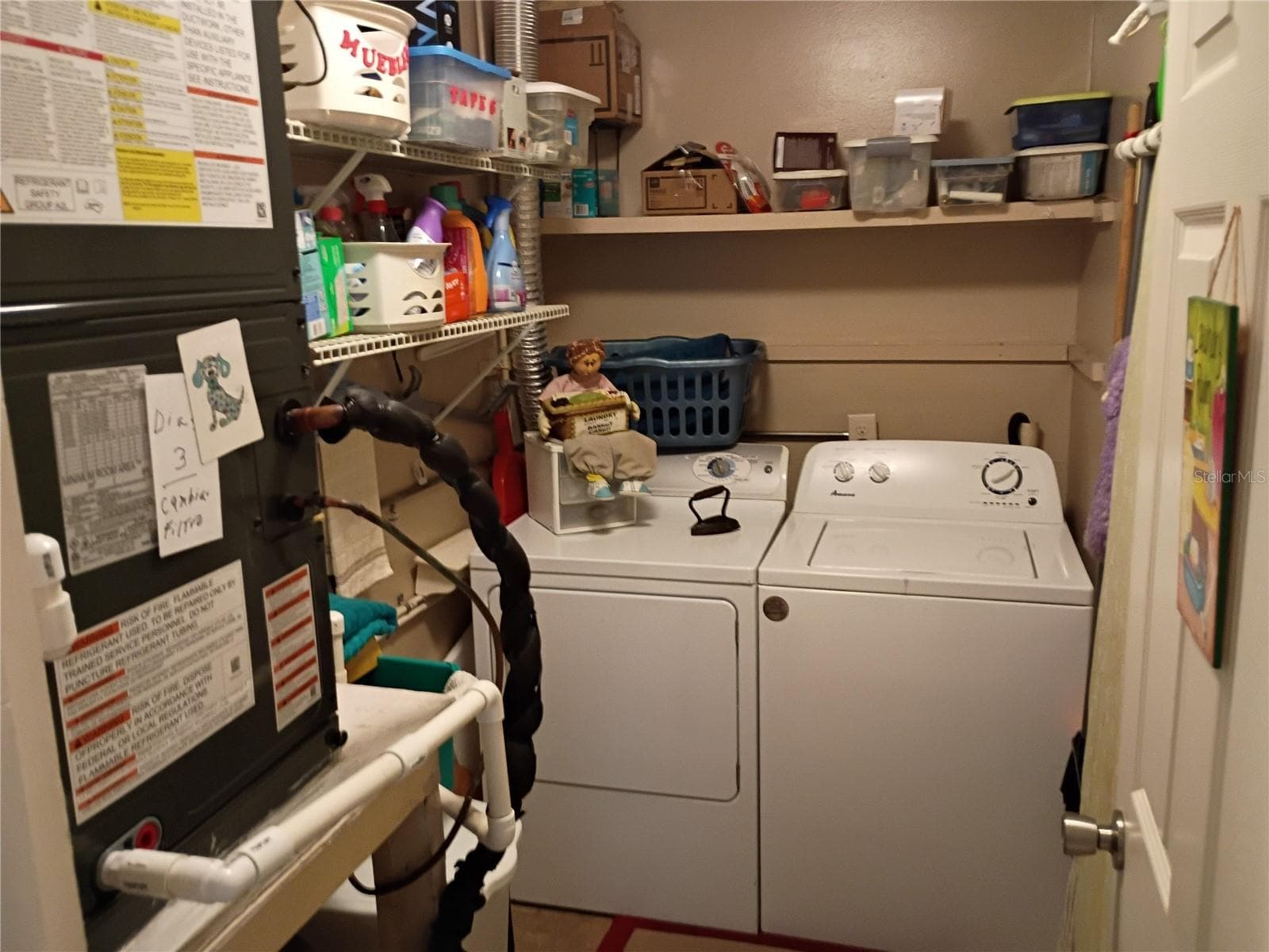 Inside Laundry storage room - 511 POLARIS LOOP #109, CASSELBERRY